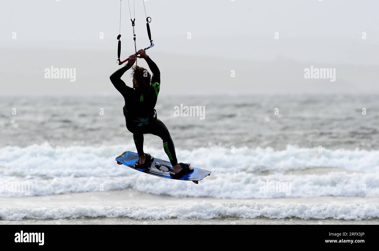 Kite Surfer taking off Stock Photo