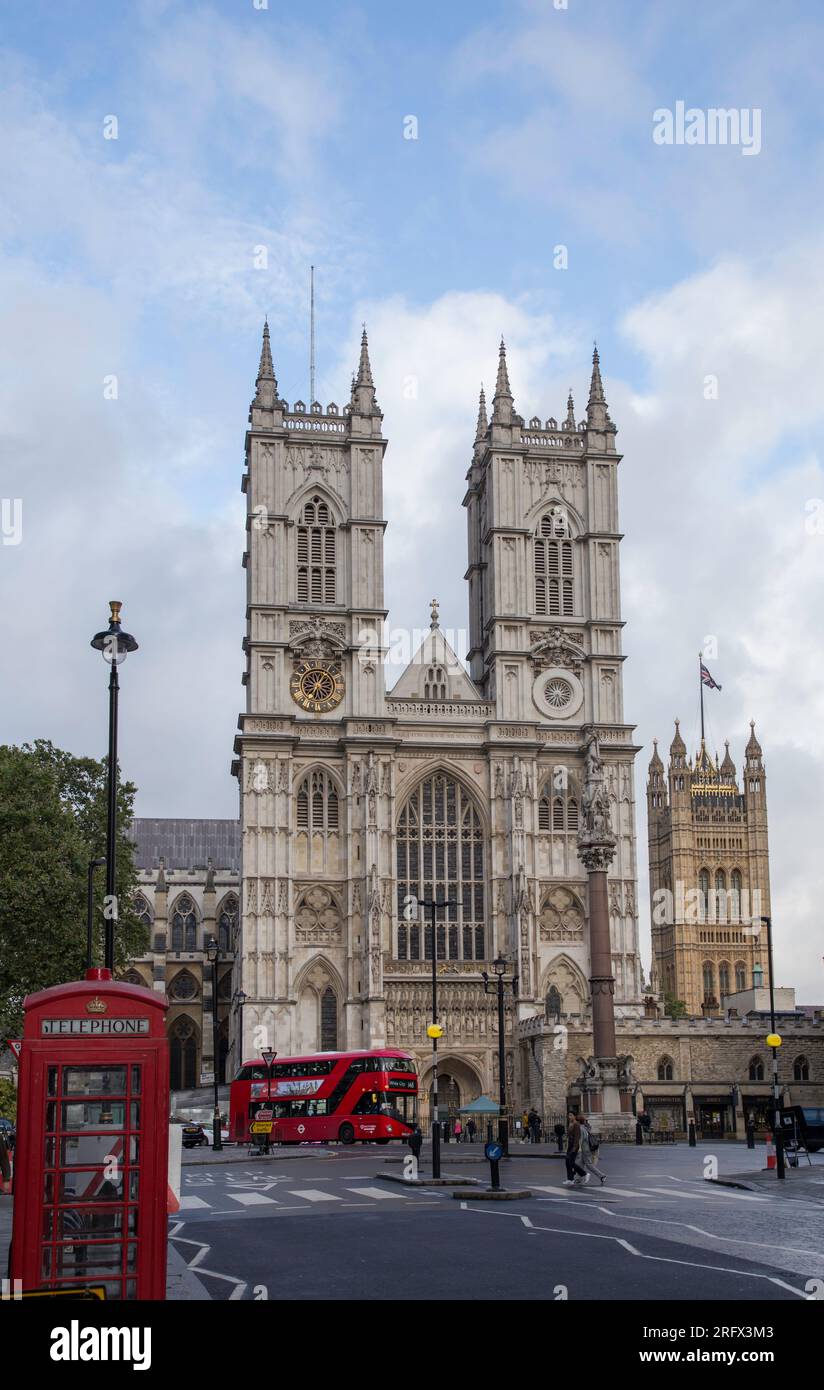 Front of Westminster Abbey with Red Bus and Red Telephone box Stock Photo