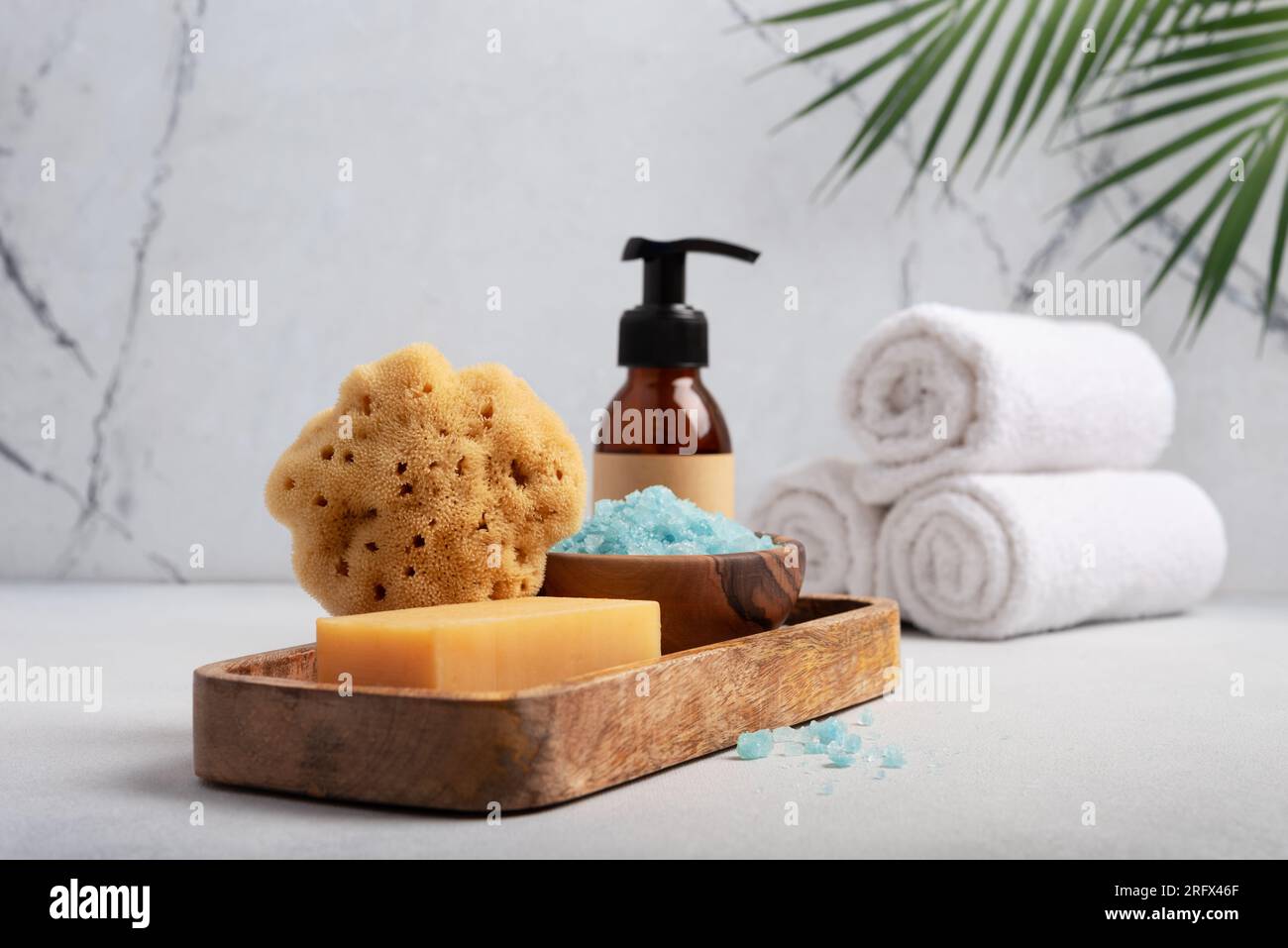 Bath Spa Setting with blue sea salt, natural wild sponge and homemade ...