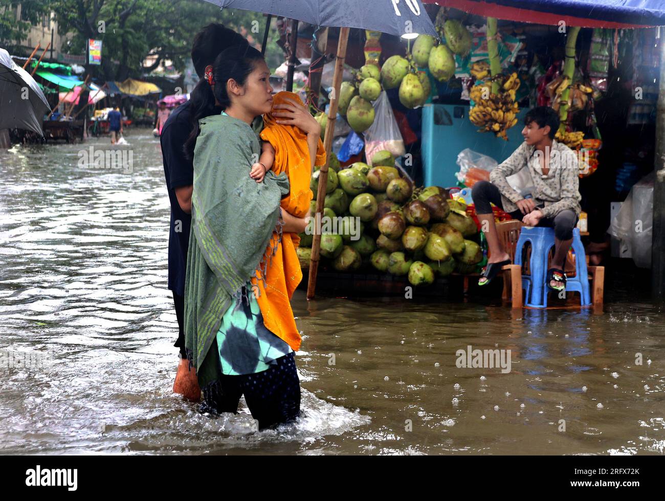 Chittagong, Agrabad, Bangladesh. 6th Aug, 2023. August 6, 2023. Chittagong, Bangladesh : Chattogram Maa-O-Shishu Hospital College area drowned due to high tide and three days of heavy rain in Chittagong, Bangladesh.Most of the areas of the city have become submerged due to rain. The road is submerged in knee-to-waist water. Furniture is getting damaged due to water entering shops and houses. Chittagong city people are suffering. (Credit Image: © Mohammed Shajahan/ZUMA Press Wire) EDITORIAL USAGE ONLY! Not for Commercial USAGE! Credit: ZUMA Press, Inc./Alamy Live News Stock Photo