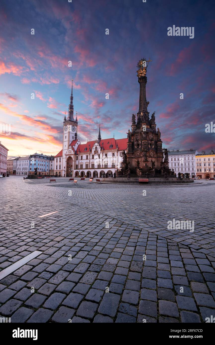 Olomouc, Czech Republic. Cityscape image of downtown Olomouc, Czech Republic with Olomouc City Hall and Honorary Holy Trinity Column at summer sunrise Stock Photo