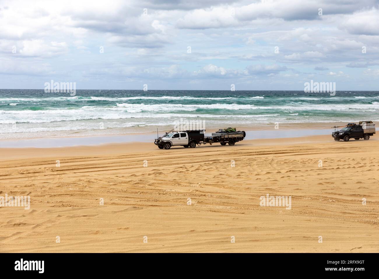 Four wheel drive vehicles on 75 mile beach highway road Fraser Island,K'gari, Queensland,Australia 2023 Stock Photo