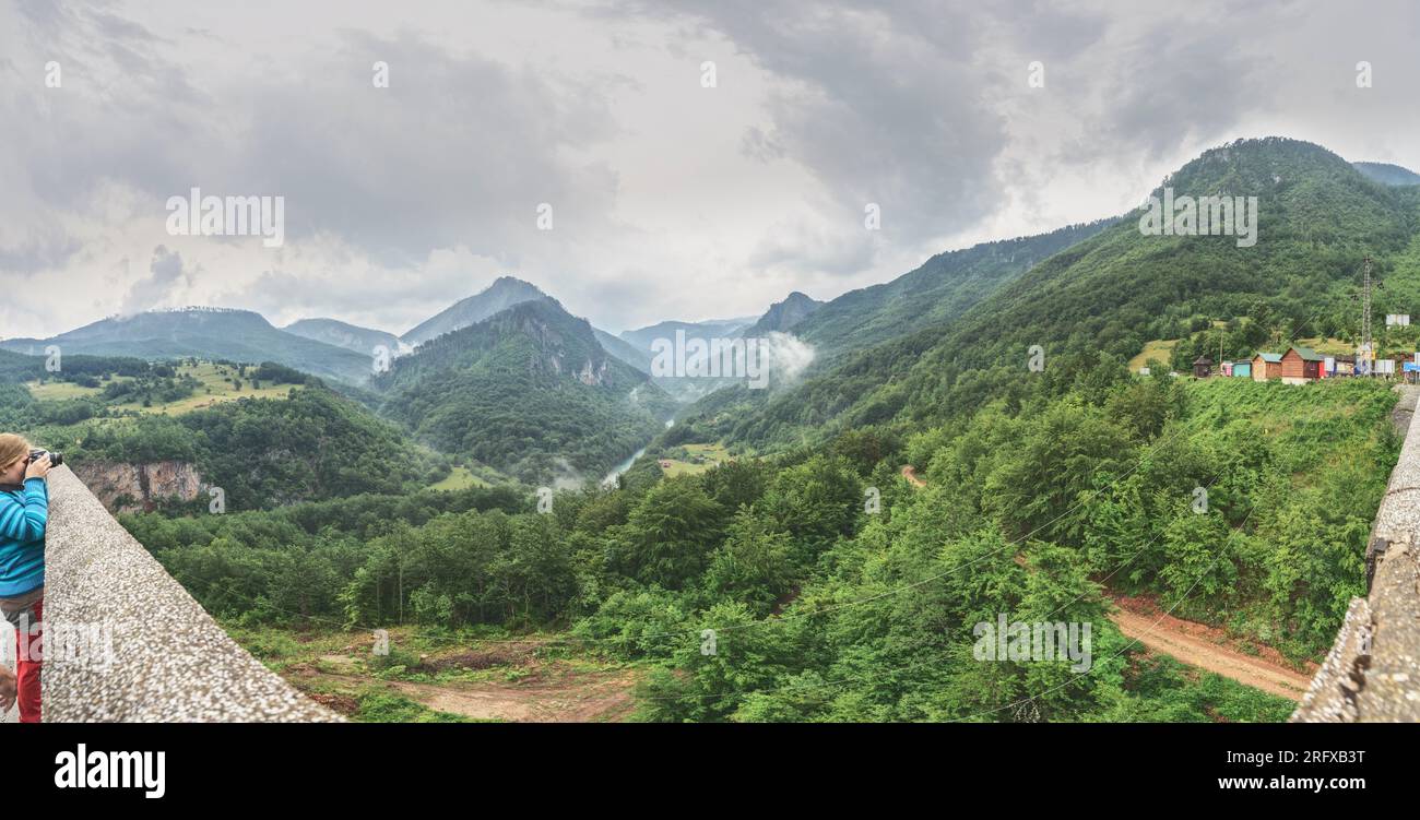 High angle scenic view of Tara river canyon from Durdevica Tara Bridge between the villages of Budečevica and Trešnjica in cloudy summer day, Monteneg Stock Photo