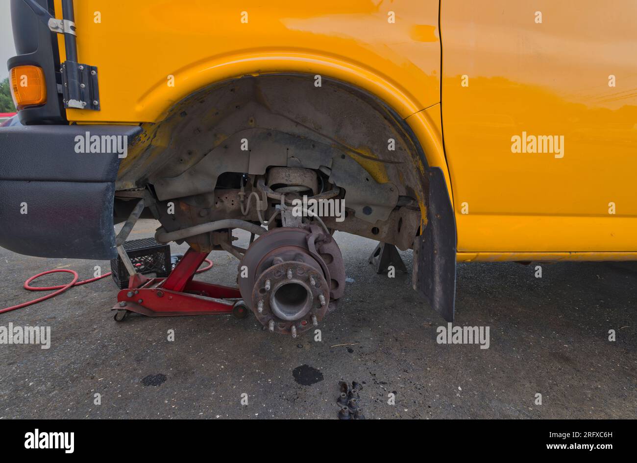School bus brakes being repaired Stock Photo Alamy