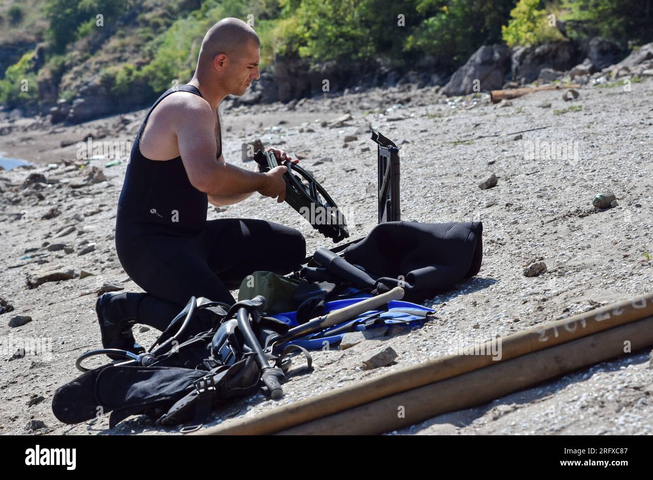 A Ukrainian sapper seen preparing for inspection during the demining of a Dnipro river in Zaporizhzhia. Ukraine’s international partners will give it over US$244 million for humanitarian mine clearance. Source: Yuliia Svyrydenko, First Deputy Prime Minister and Minister of Economic Development and Trade of Ukraine. Ukraine will also receive individual mine clearance kits, explosive protective suits, quadcopters, and robotic systems for the disposal of ammunition. Stock Photo