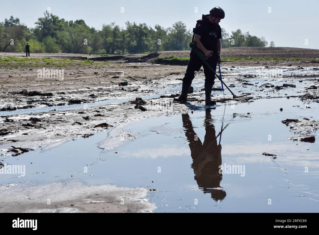 A Ukrainian sapper inspects the shoreline during the demining of a Dnipro river in Zaporizhzhia. Ukraine’s international partners will give it over US$244 million for humanitarian mine clearance. Source: Yuliia Svyrydenko, First Deputy Prime Minister and Minister of Economic Development and Trade of Ukraine. Ukraine will also receive individual mine clearance kits, explosive protective suits, quadcopters, and robotic systems for the disposal of ammunition. Stock Photo