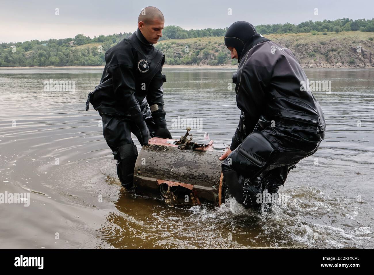 Ukrainian sappers take fragment of a Russian missile out of a Dnipro river in Zaporizhzhia. Ukraine’s international partners will give it over US$244 million for humanitarian mine clearance. Source: Yuliia Svyrydenko, First Deputy Prime Minister and Minister of Economic Development and Trade of Ukraine. Ukraine will also receive individual mine clearance kits, explosive protective suits, quadcopters, and robotic systems for the disposal of ammunition. Stock Photo