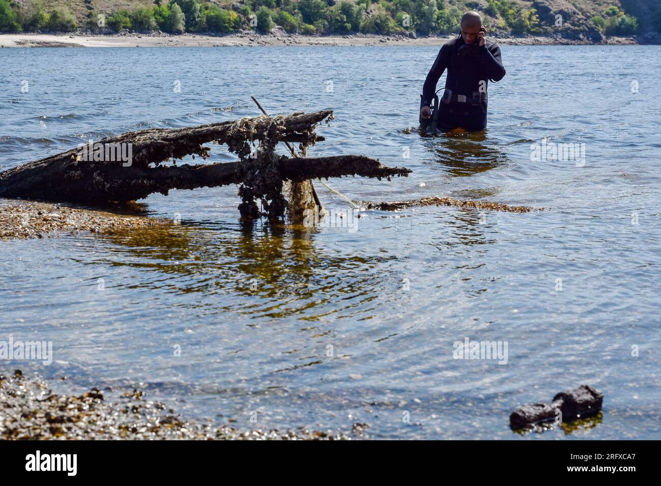 A Ukrainian sapper inspects the river during the demining of a Dnipro river in Zaporizhzhia. Ukraine’s international partners will give it over US$244 million for humanitarian mine clearance. Source: Yuliia Svyrydenko, First Deputy Prime Minister and Minister of Economic Development and Trade of Ukraine. Ukraine will also receive individual mine clearance kits, explosive protective suits, quadcopters, and robotic systems for the disposal of ammunition. Stock Photo