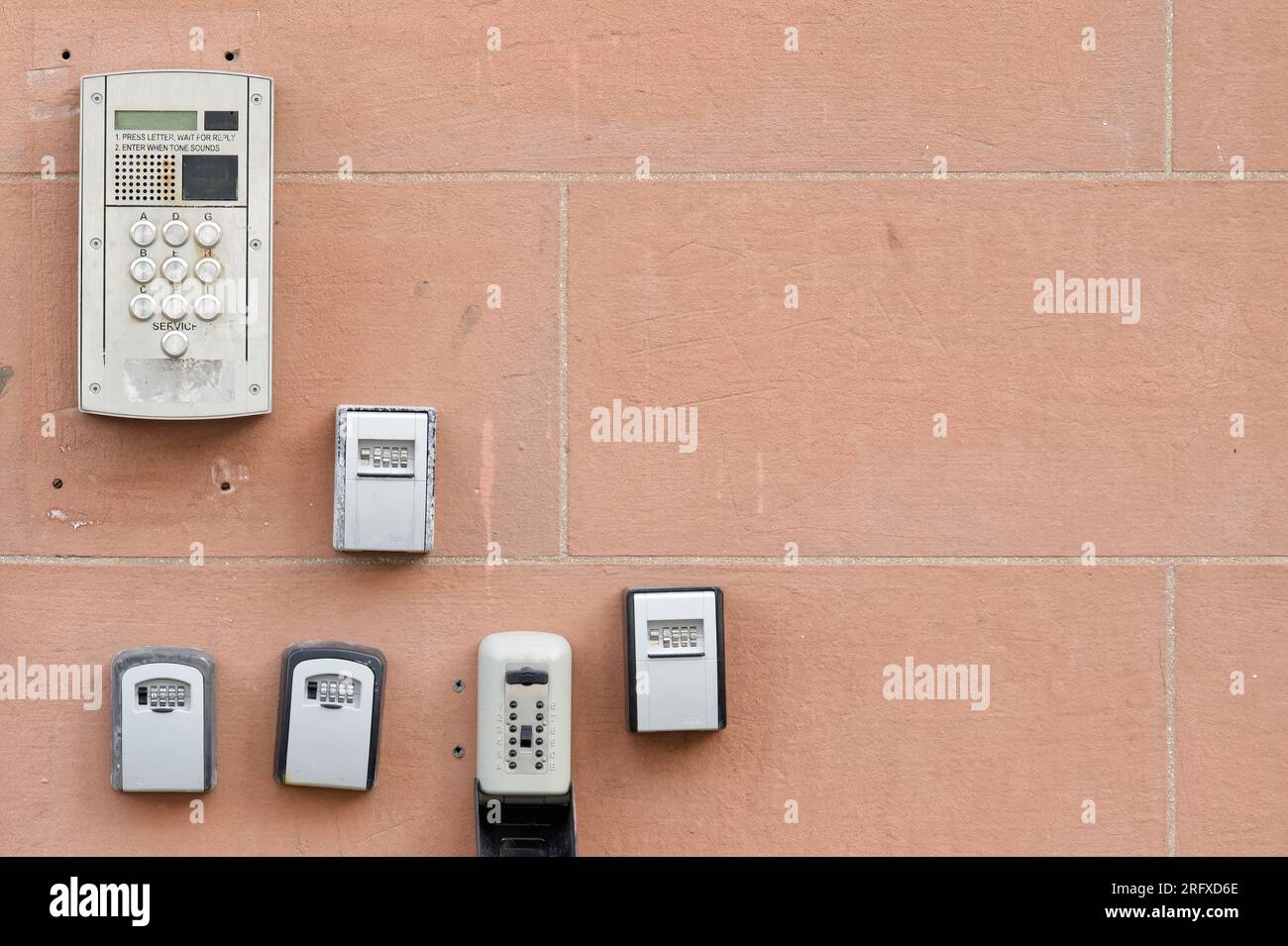 Push buzzer door bells for entry to building Stock Photo Alamy