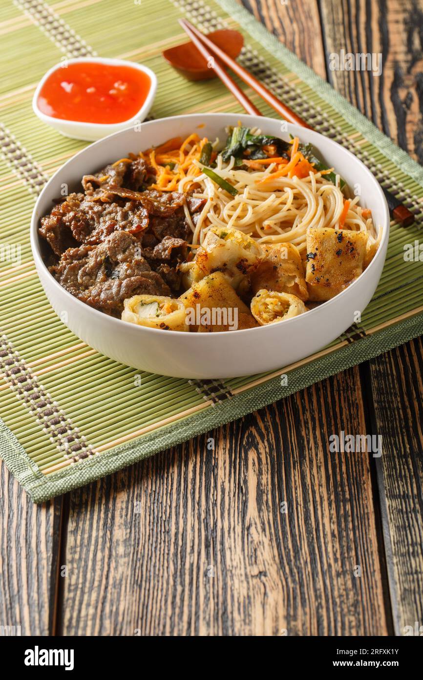 Bowl of traditional Vietnamese noodle salad Bun Bo Nam Bo, with beef