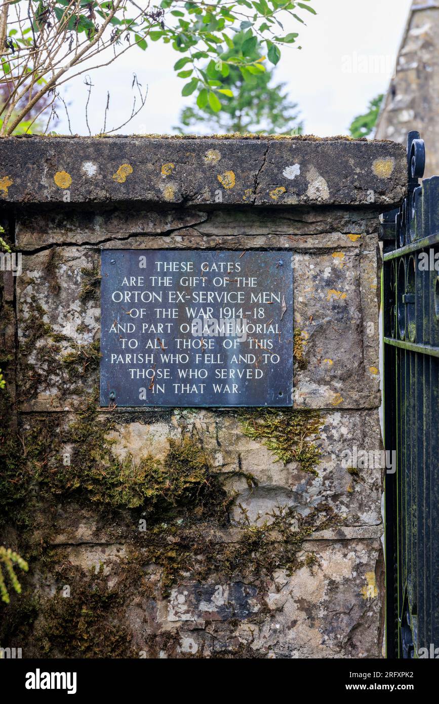 At the entrance to All Saints Church, A plaque commemorating the gift of  gates by the ex servicemen of Orton who served and fell in the war 1914-1918 Stock Photo