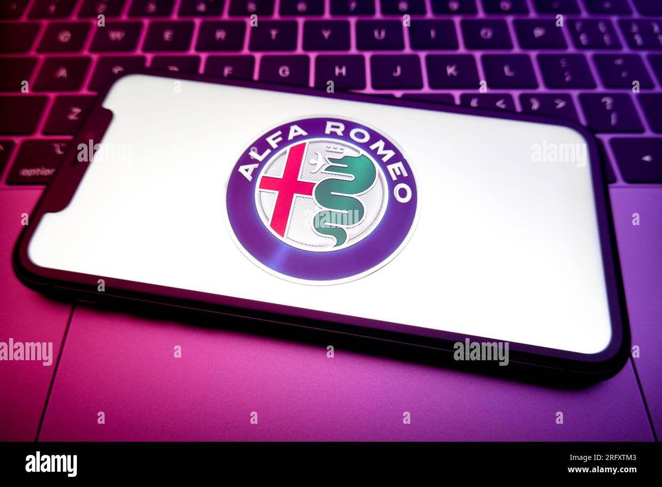 China. 06th Aug, 2023. In this photo illustration, the Alfa Romeo logo is displayed on the screen of a smartphone. The Alfa Romeo emblem is considered one of the best automobile logos in the history of graphic design, despite the fact that the symbol has undergone numerous changes over the years. Credit: SOPA Images Limited/Alamy Live News Stock Photo