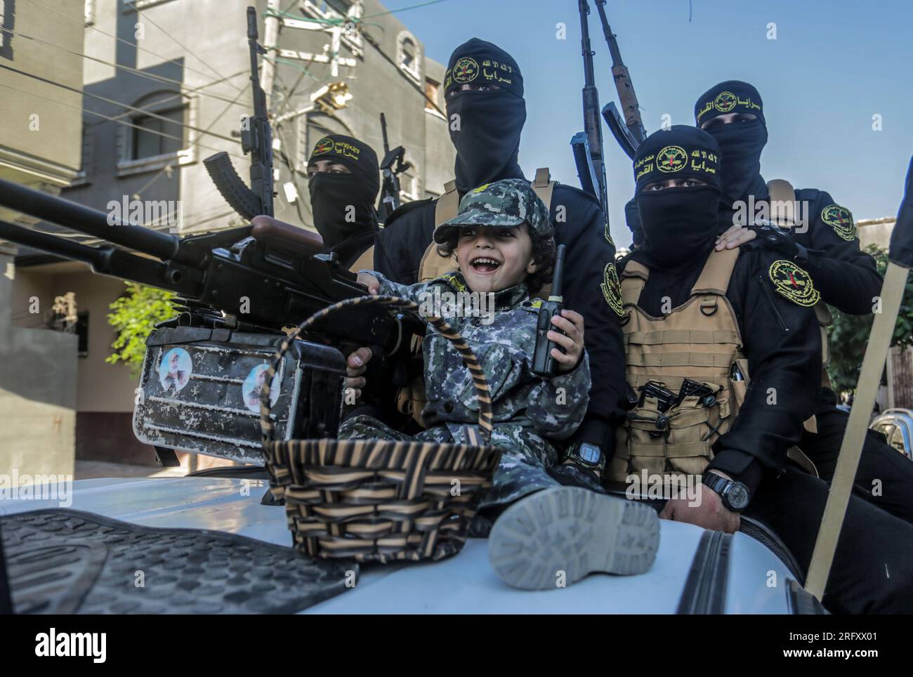 gaza-city-palestine-05th-aug-2023-masked-militants-from-al-quds-brigades-the-military-wing-of-palestinian-islamic-jihad-movement-participate-in-a-military-parade-on-the-first-anniversary-of-the-israeli-escalation-in-the-gaza-strip-in-gaza-city-credit-sopa-images-limitedalamy-live-news-2RFXX01.jpg