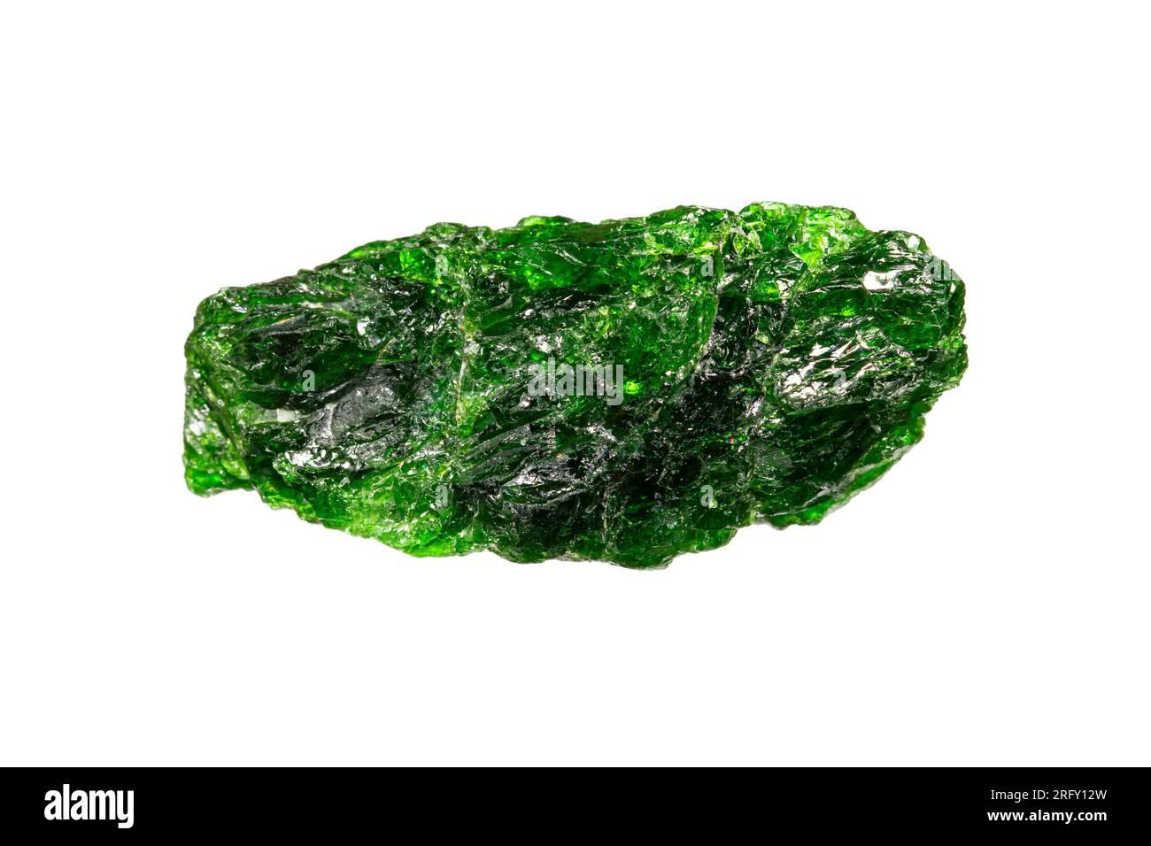 Closeup natural rough green chrome diopside (siberian emerald) crystal on white background Stock Photo