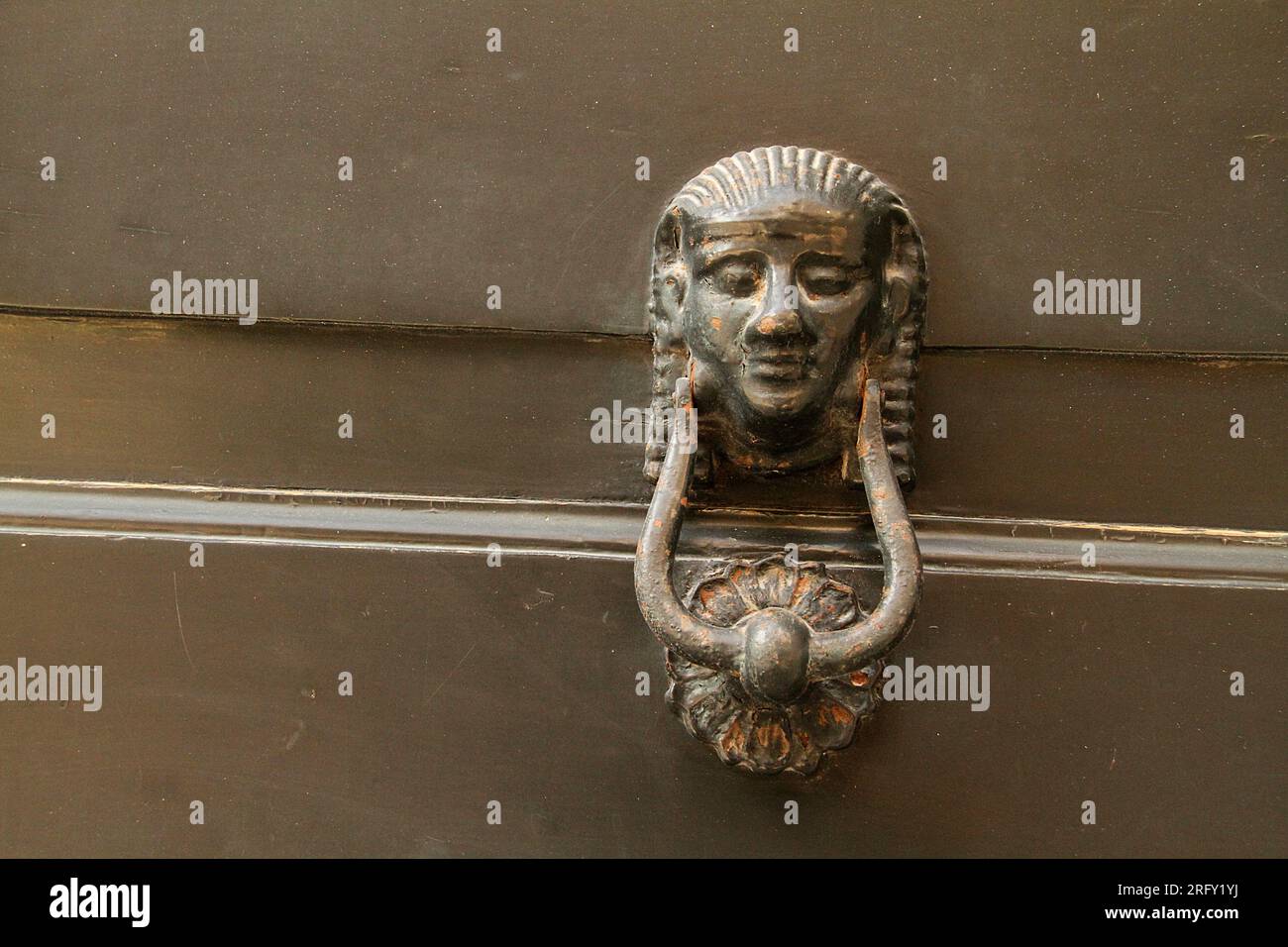 Lecce, Italy. Old fashioned artistic door knocker. Stock Photo