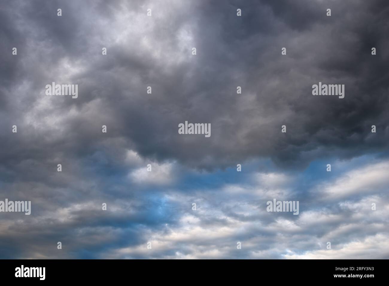 Dark gray nimbostratus clouds with white clouds covering sky Stock ...
