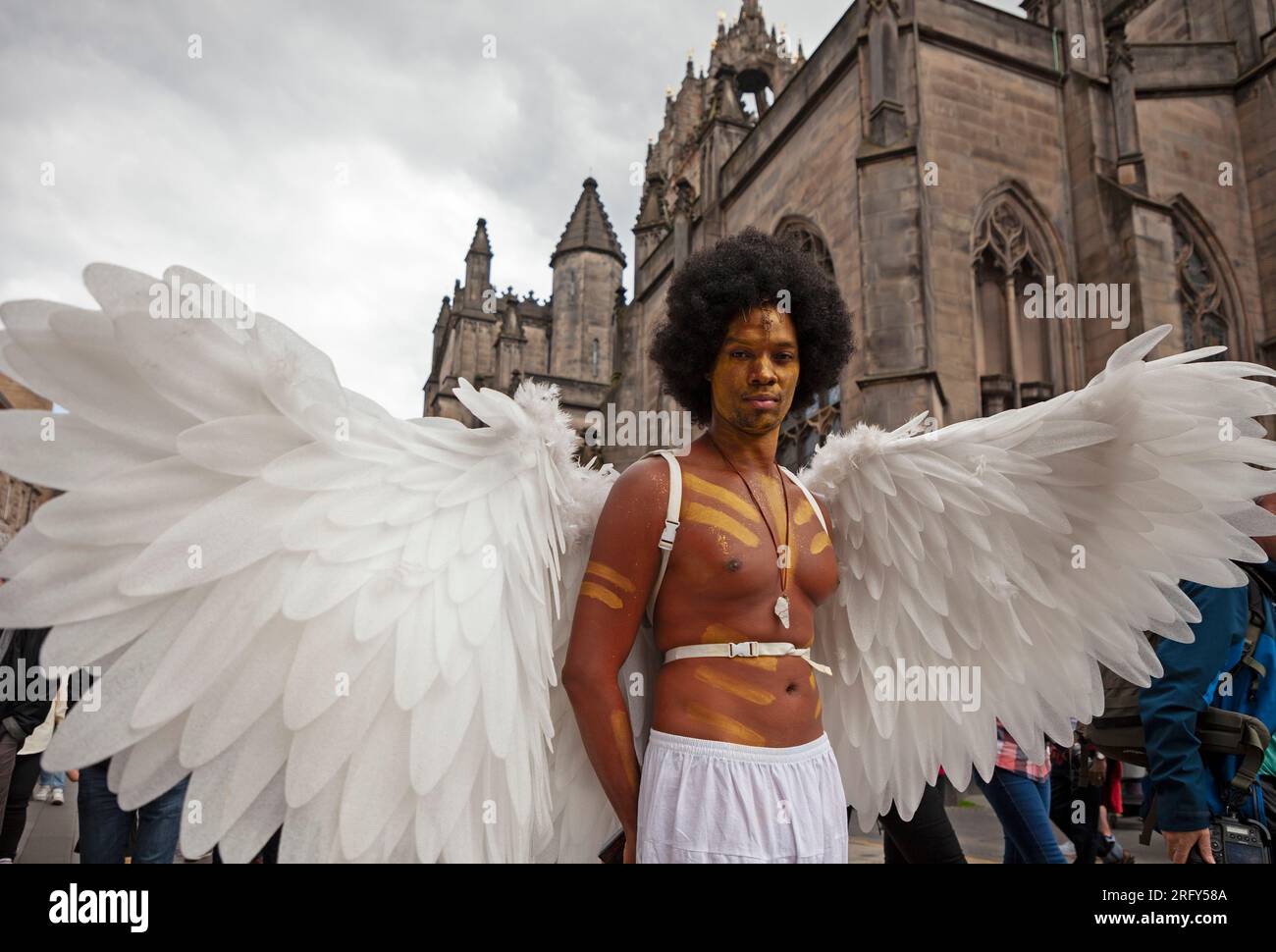 Edinburgh Festival Fringe. Royal Mile, Scotland. 8 August 2023. Pictured: Deaon Griffin-Pressley in front of St Giles Cathedral, from, Satan Vs God, DGP Theatre Productions, Florida USA. C Arts C Venues C  August 6-13, 15-27 Credit: Archwhite/alamy live news. Stock Photo
