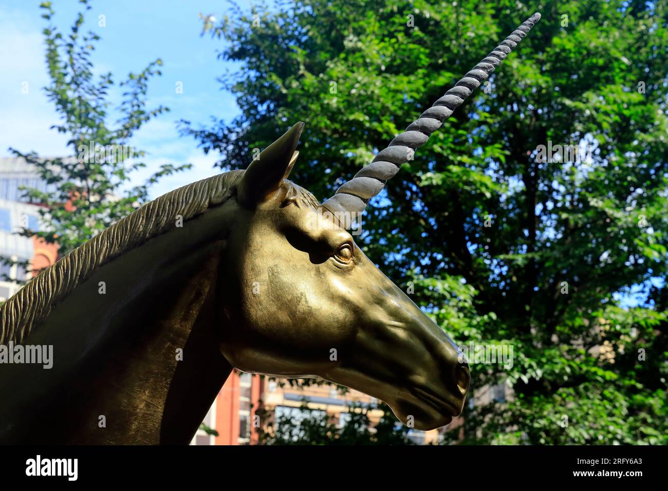 Head of a Golden Unicorn, Welsh Back, Bristol. Part of Unicornfest, Bristol.  Designed by Bo Lanyon. August 2023. Summer Stock Photo