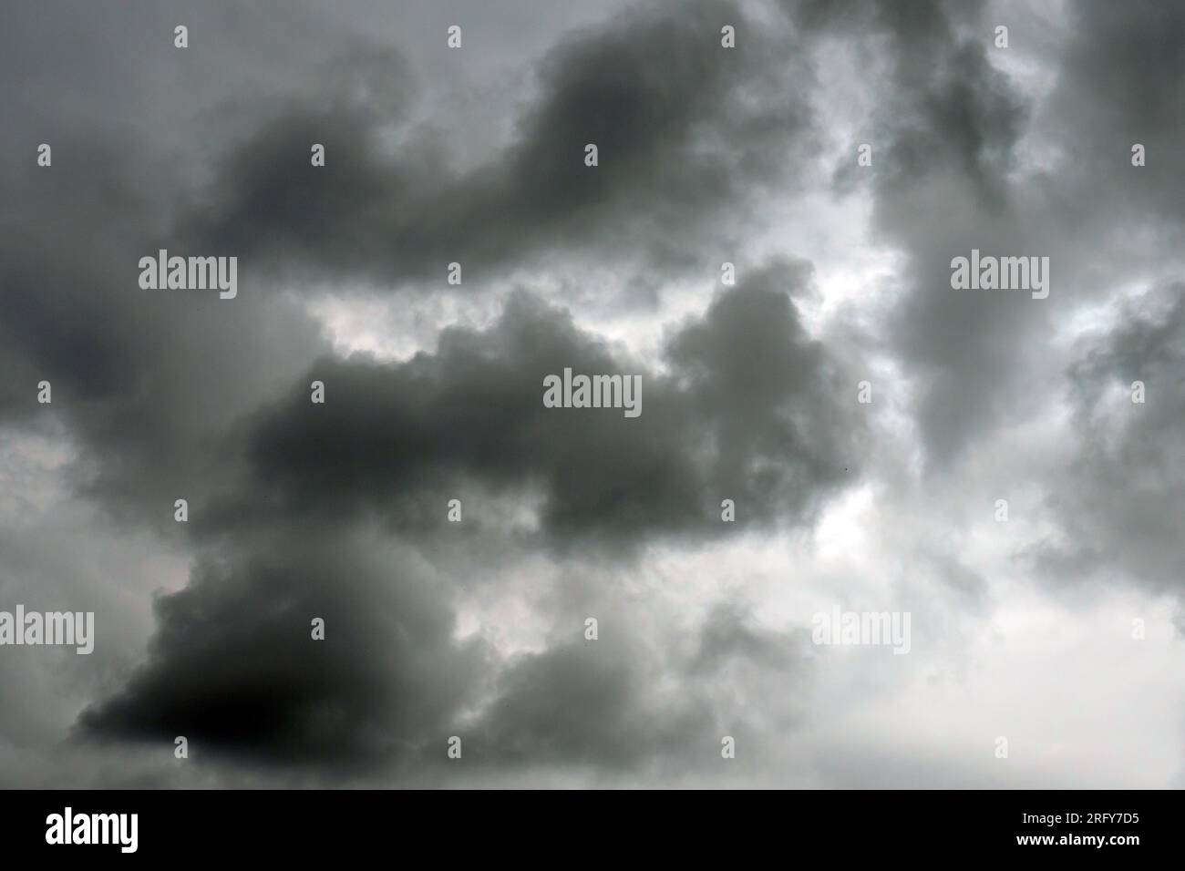 Dramatic storm clouds before a thunder-storm. Dark moody view Stock Photo