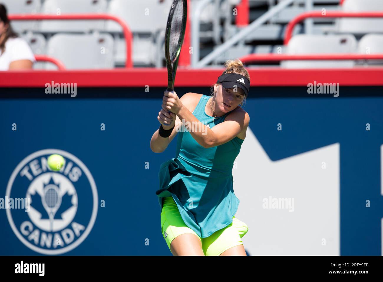 August 06, 2023 Ashlyn Krueger (USA) returns the ball during the WTA National Bank Open qualifying round match at IGA Stadium in Montreal, Quebec