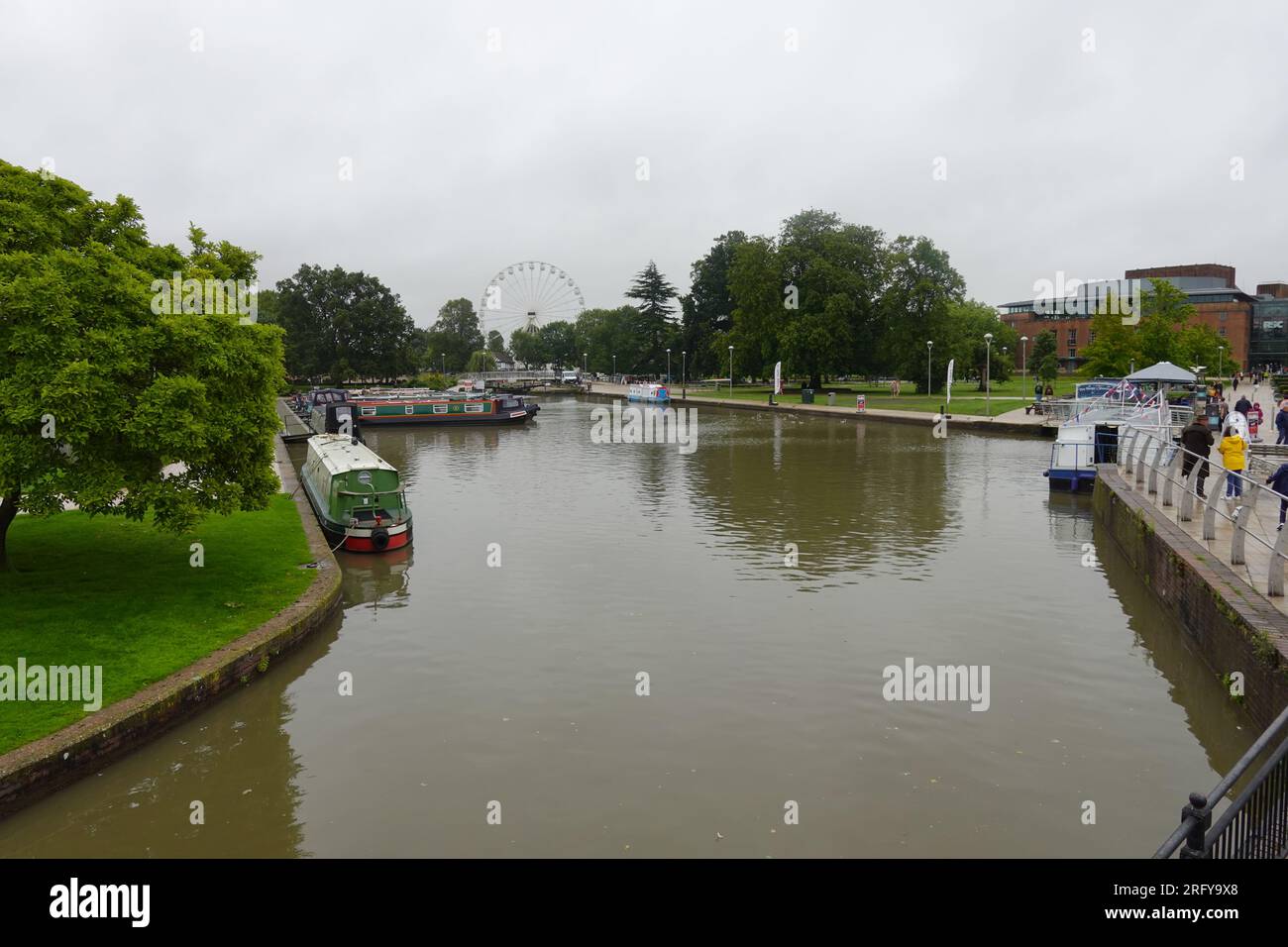 Stratford upon Avon Canal with Ferris wheel in the background Stock