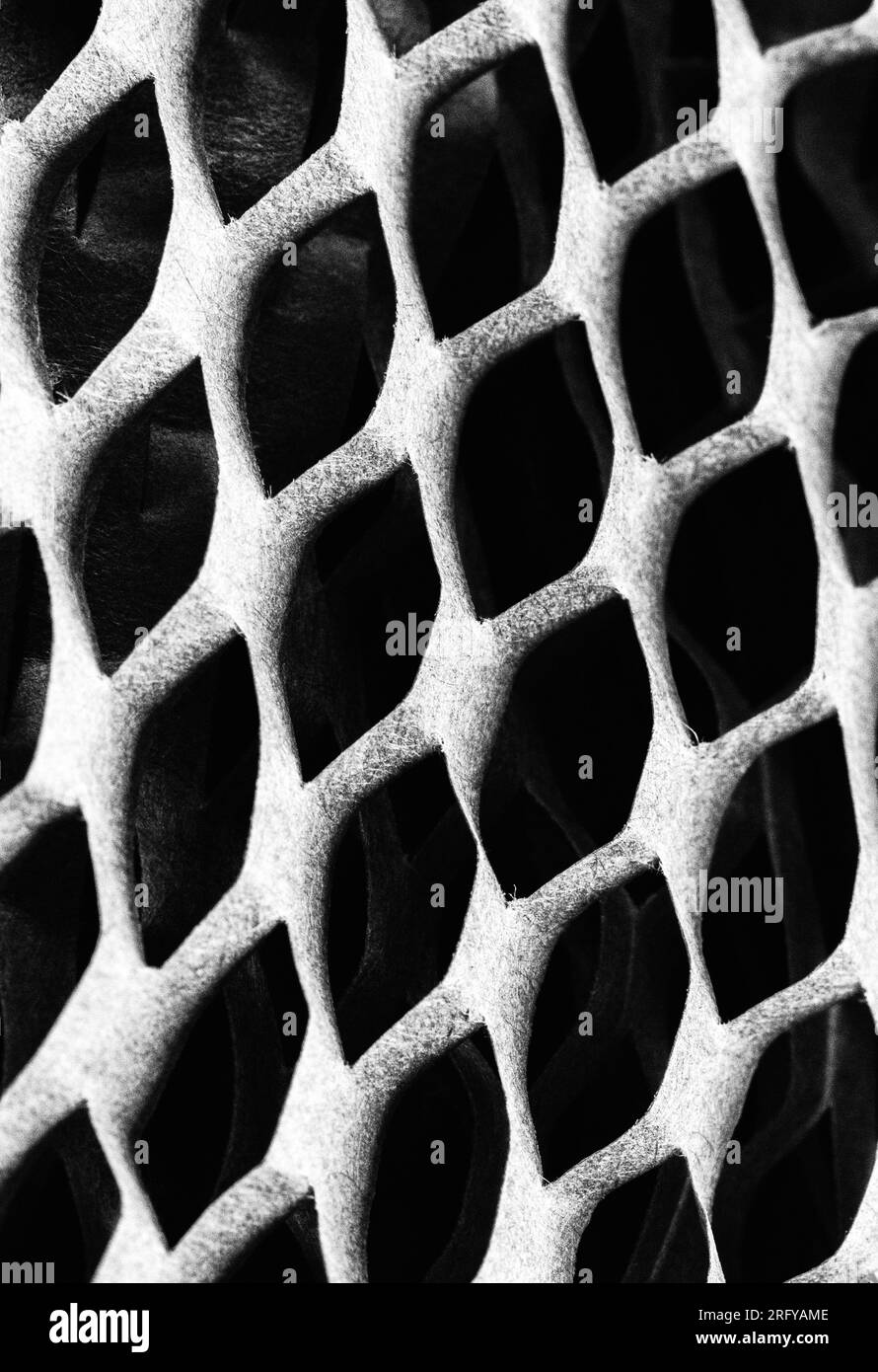 Honeycomb packing paper creates geometric patterns Stock Photo