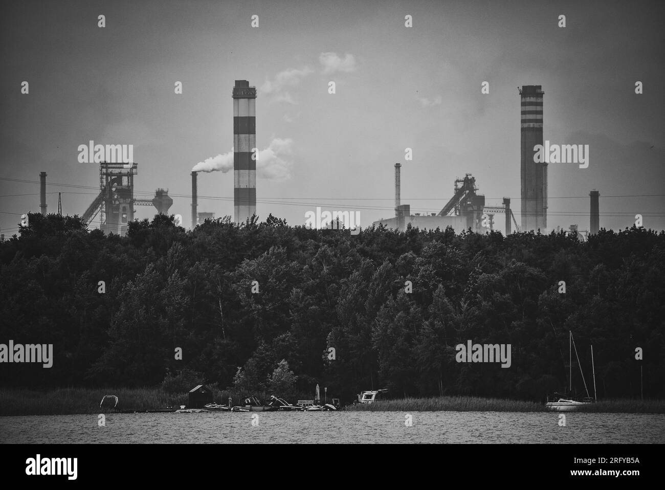 Industrial steel factory, iron works. Metallurgical plant. steelworks. Heavy industry in Europe. Air pollution from chimneys. Ironworks on a backgroun Stock Photo
