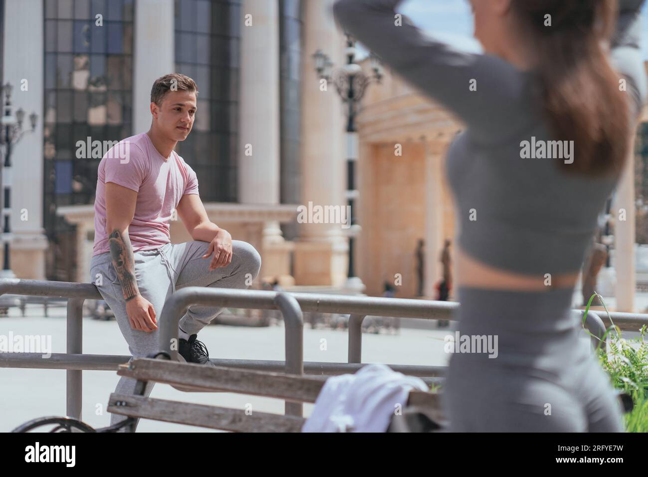 Good looking male started falling in love with his female friend. He is staring at her Stock Photo