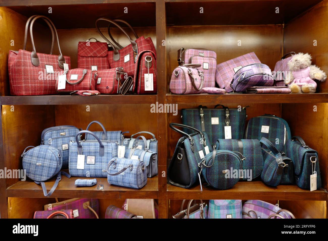 Colorful tweed handbags in a store in Aviemore in the Scottish Highlands Stock Photo