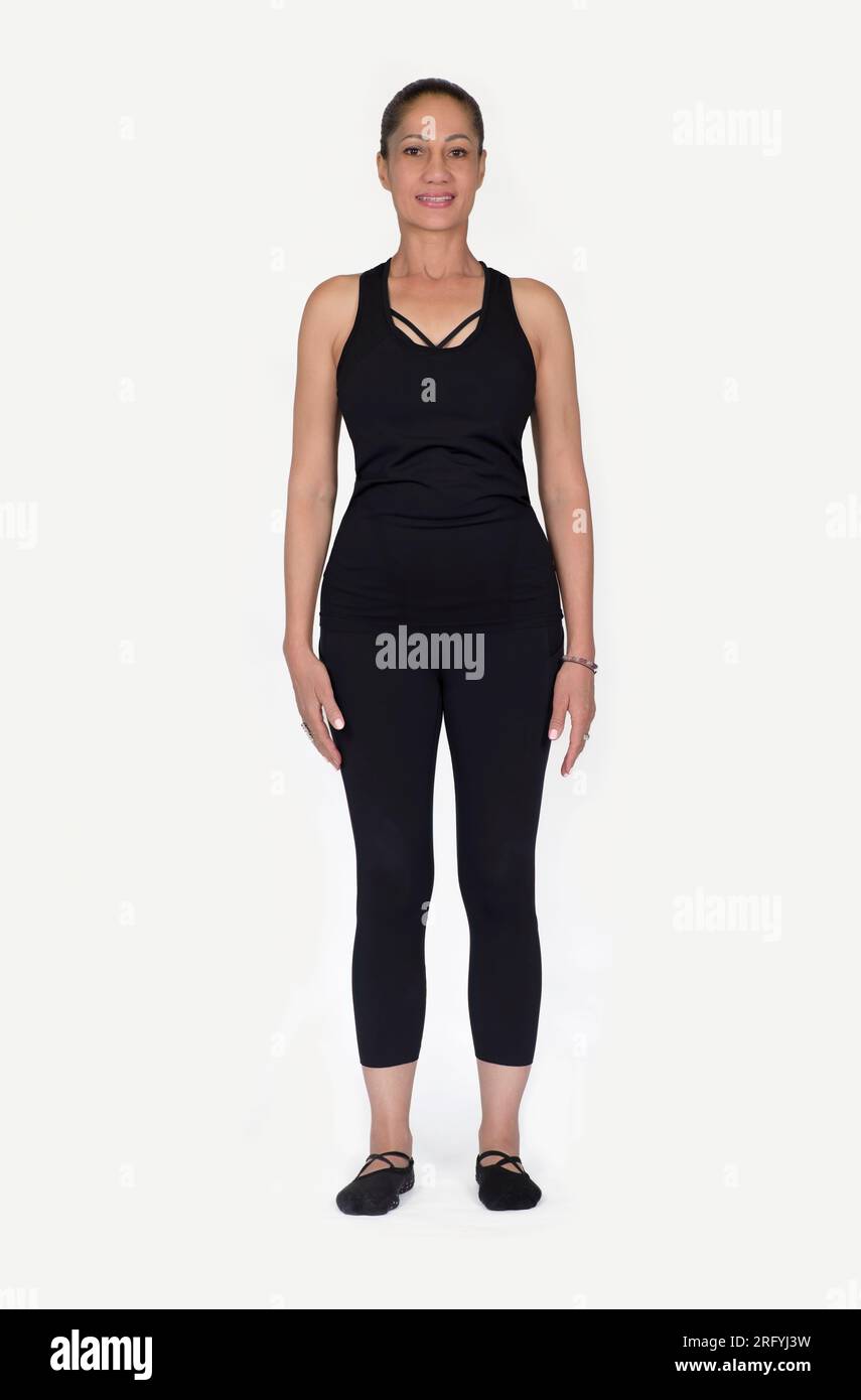 Specialized trauma releasing exercises for elderly people, 55 years old woman trainer posing for