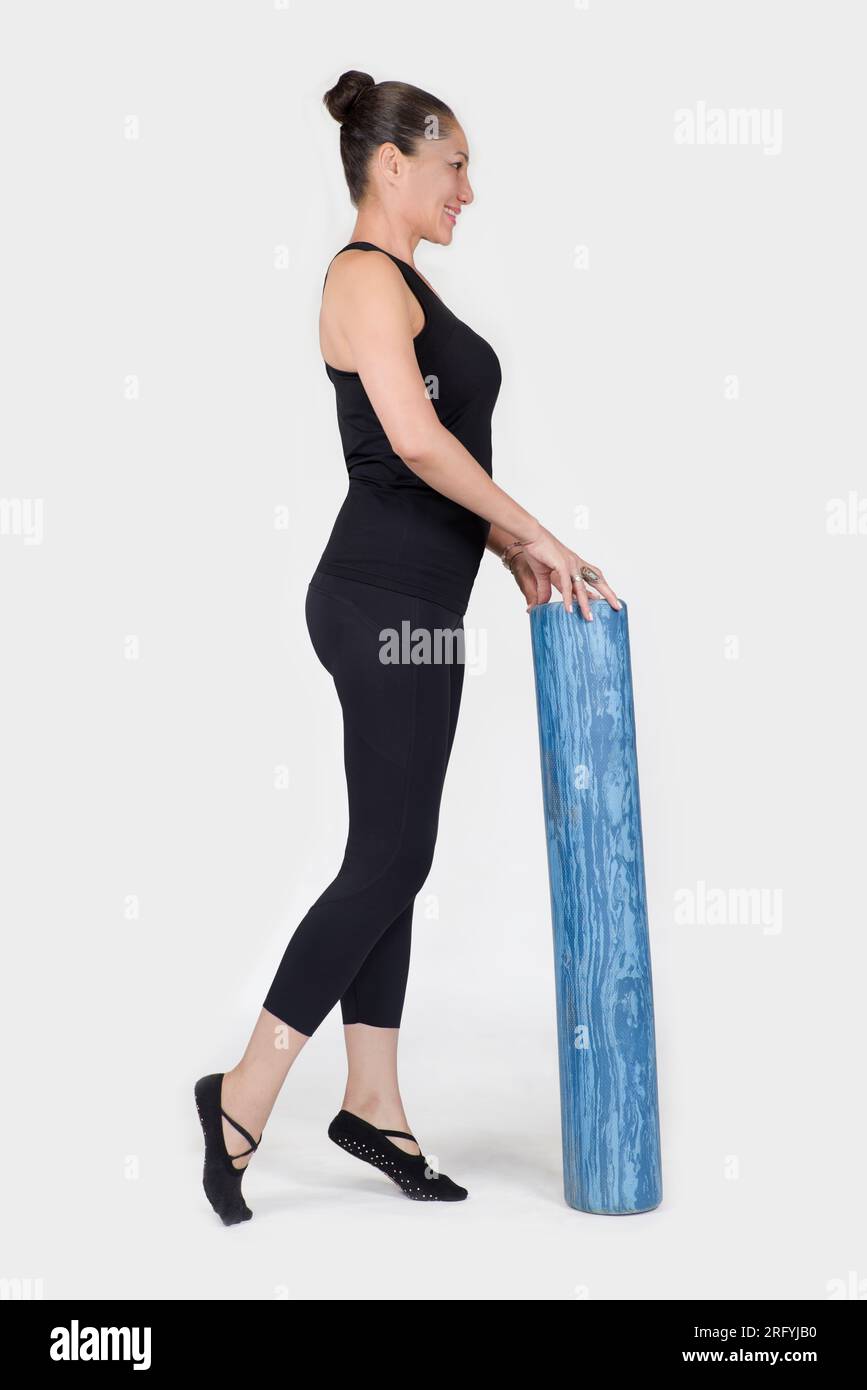 Specialized trauma releasing exercises for elderly people, 55 years old woman trainer posing for