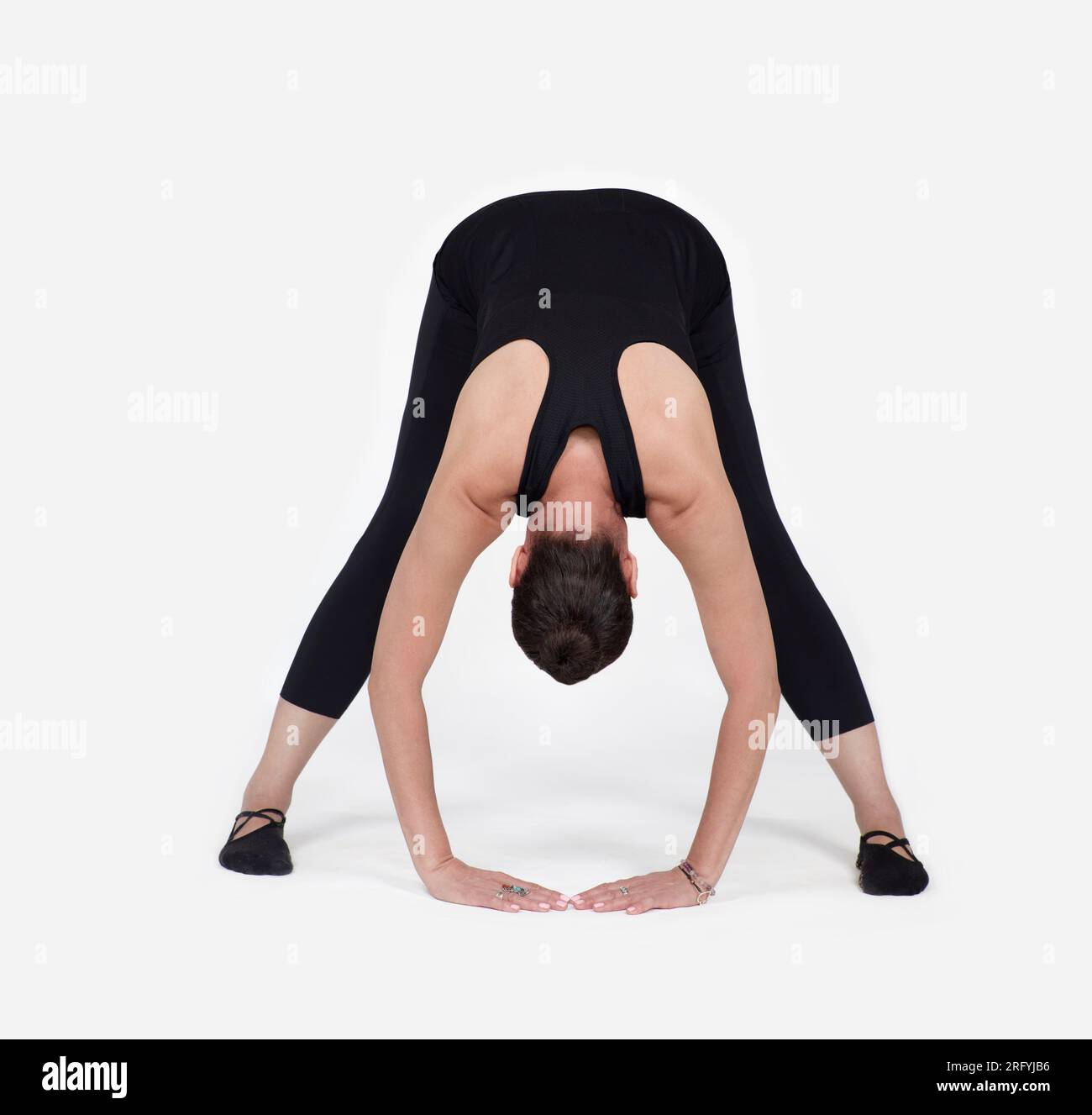 Specialized trauma releasing exercises for elderly people, 55 years old woman trainer posing for