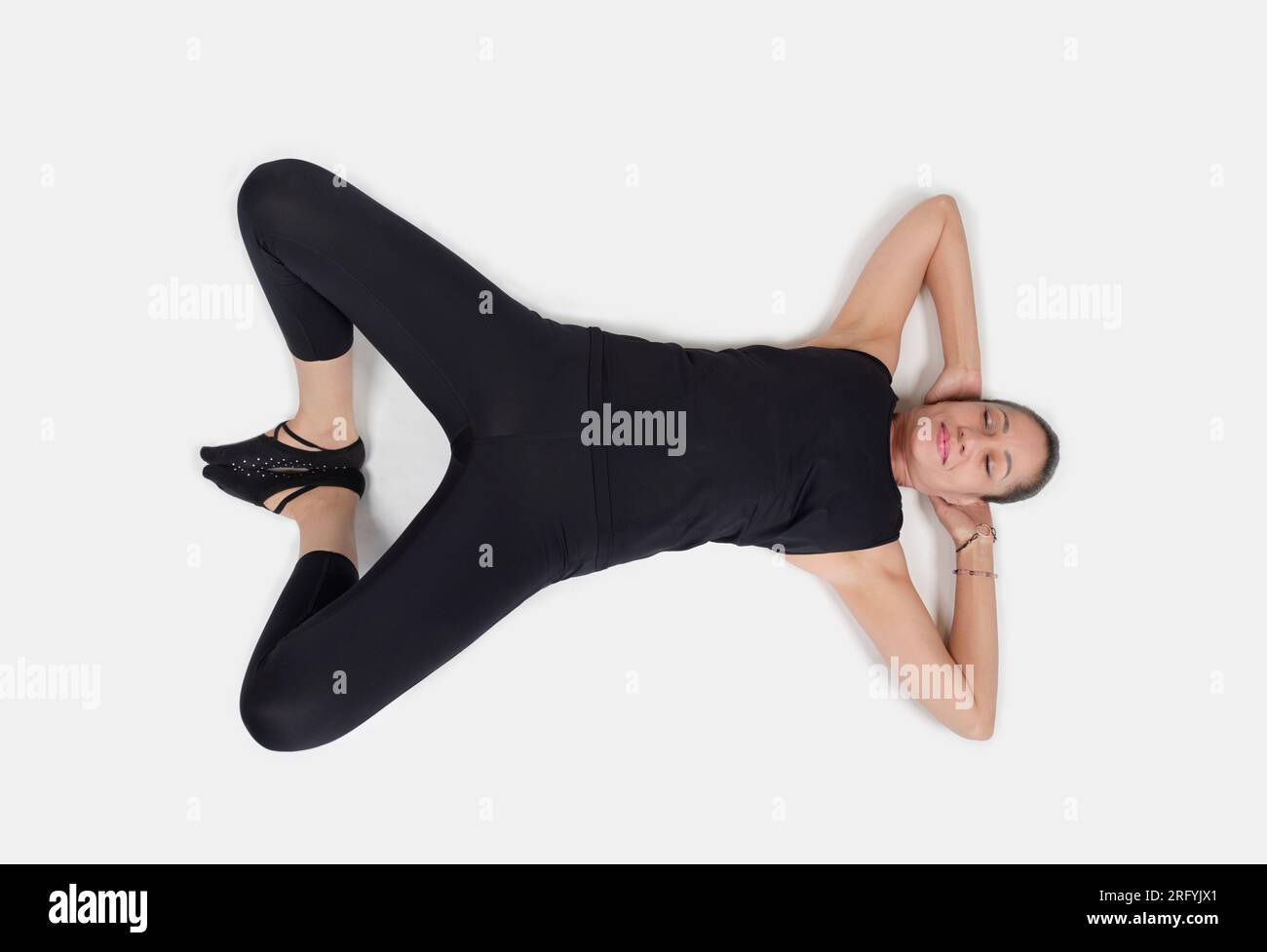 Specialized trauma releasing exercises for elderly people, 55 years old woman trainer posing for