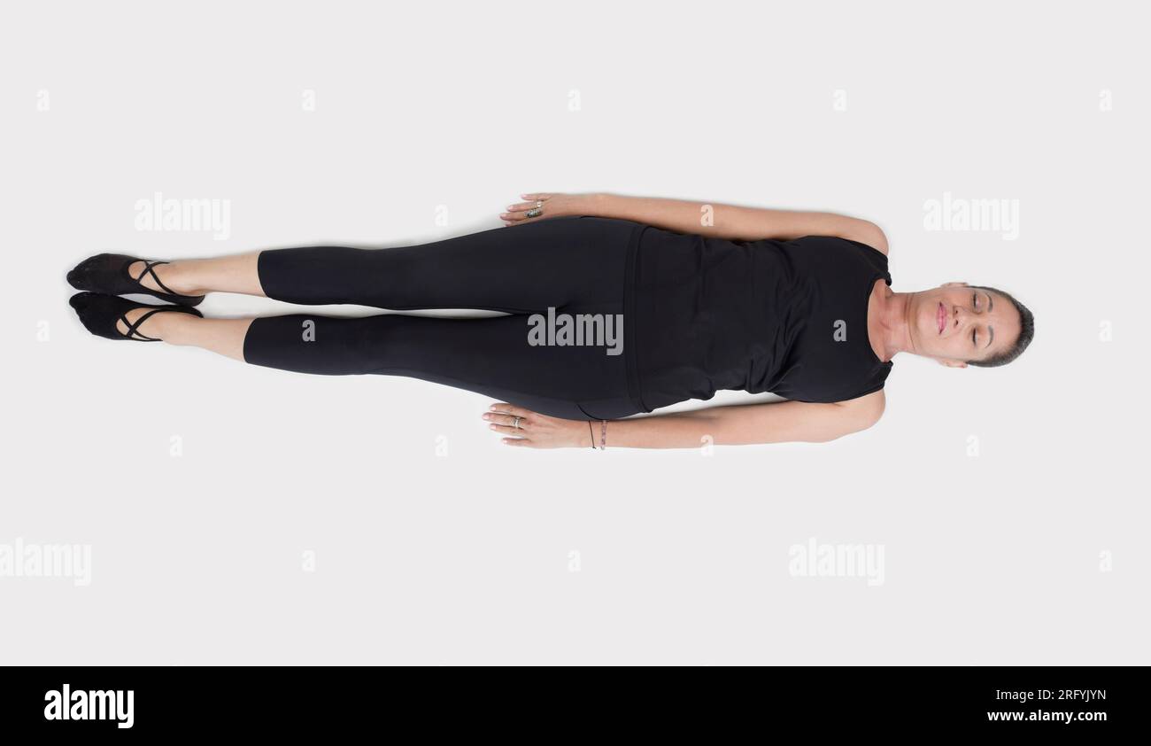 Specialized trauma releasing exercises for elderly people, 55 years old woman trainer posing for