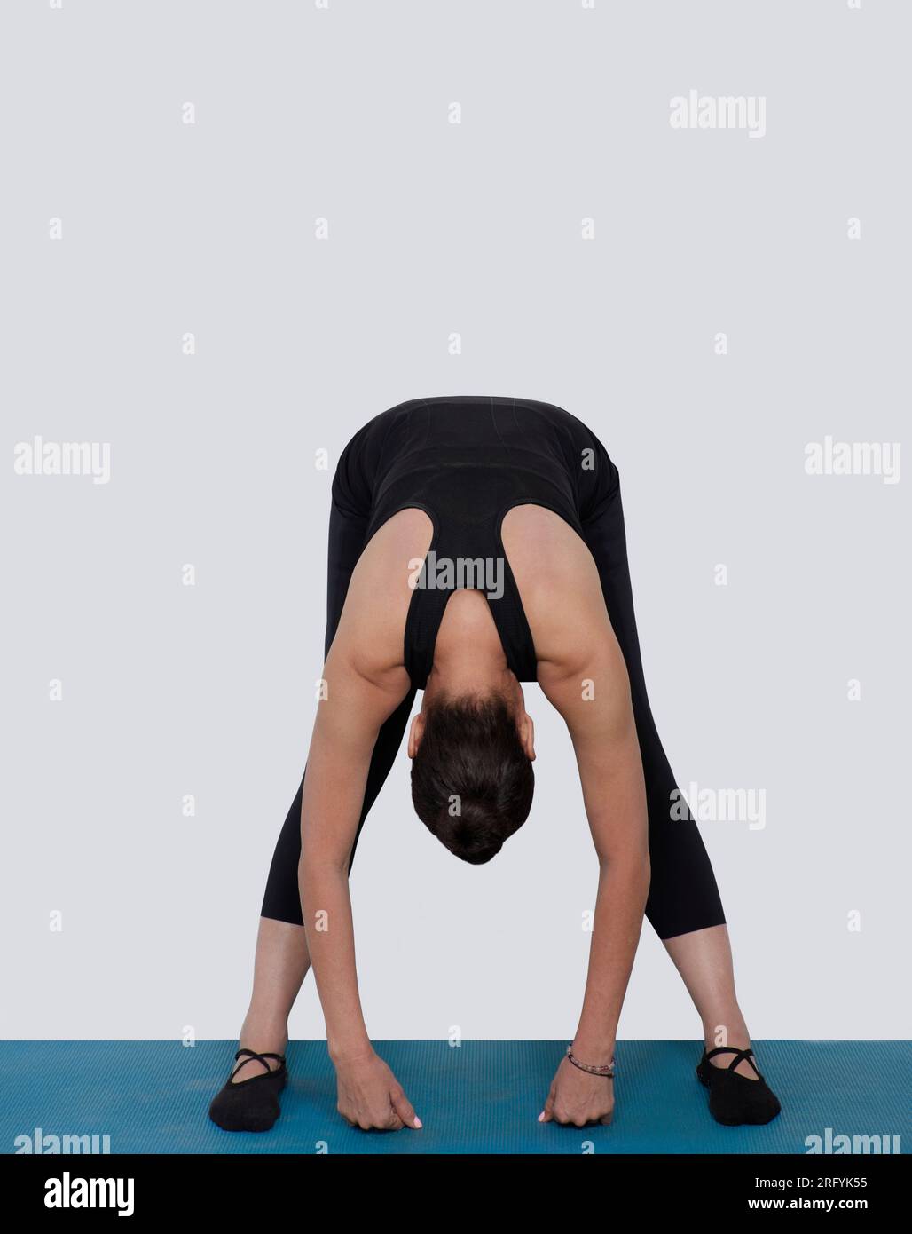Specialized trauma releasing exercises for elderly people, 55 years old woman trainer posing for