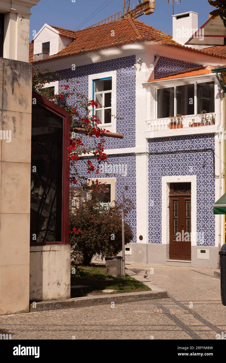 Aveiro's picturesque allure: Colorful canals, timeless azulejos, and graceful moliceiro boats 