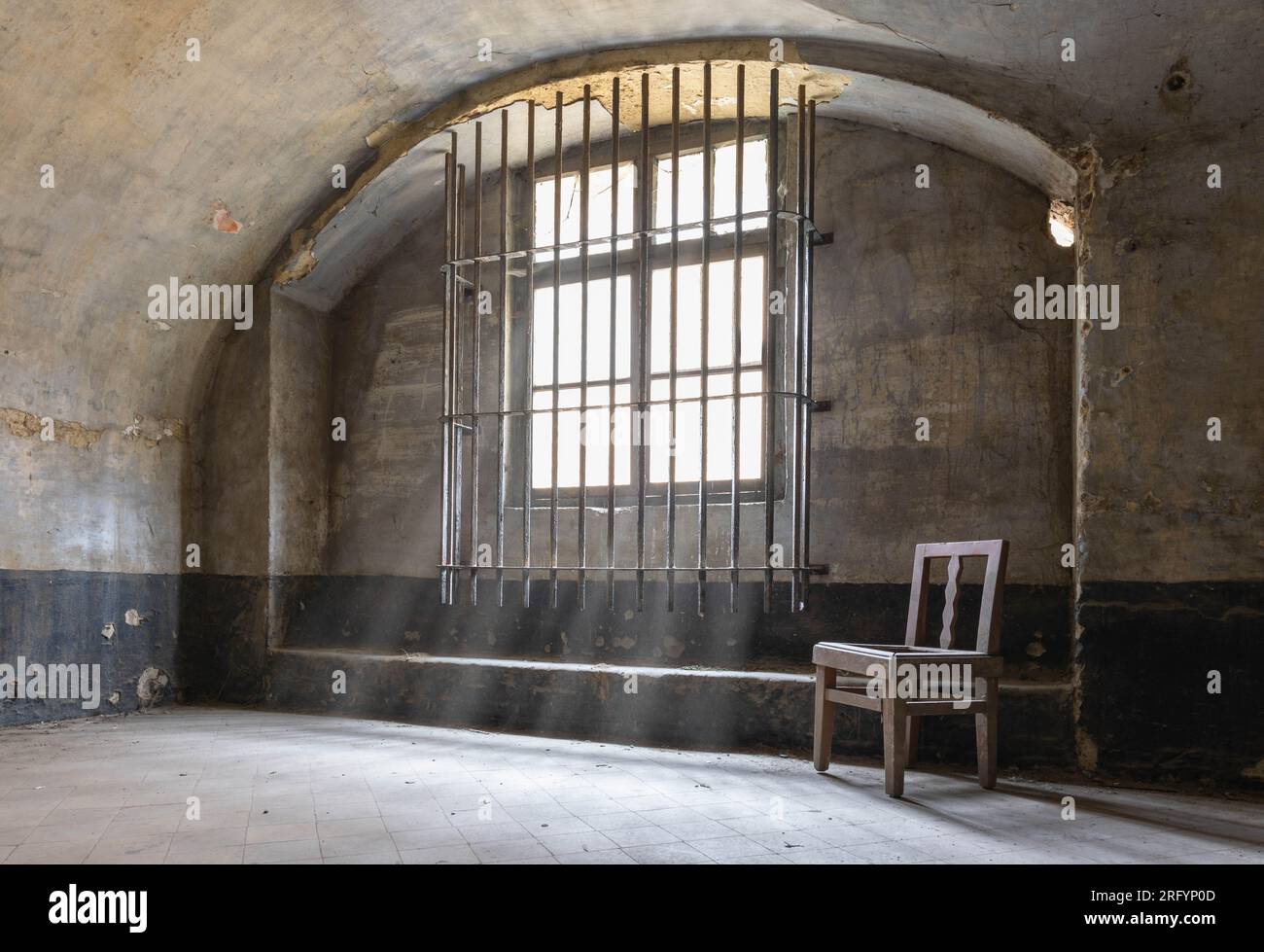 A window in a abandoned prison. Stock Photo