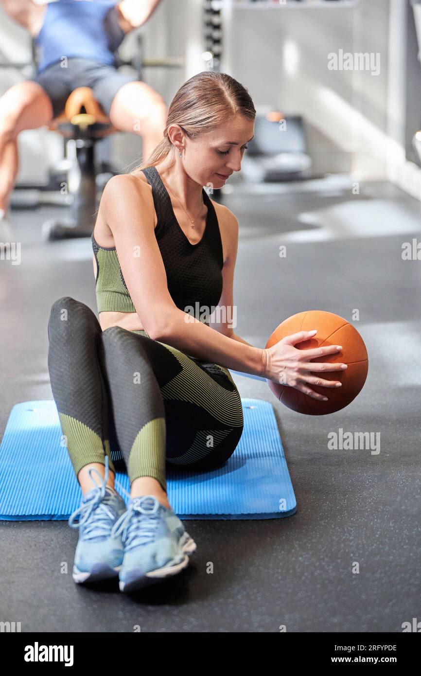 Work out fitness woman doing sit ups abs abdominal crunches core ...