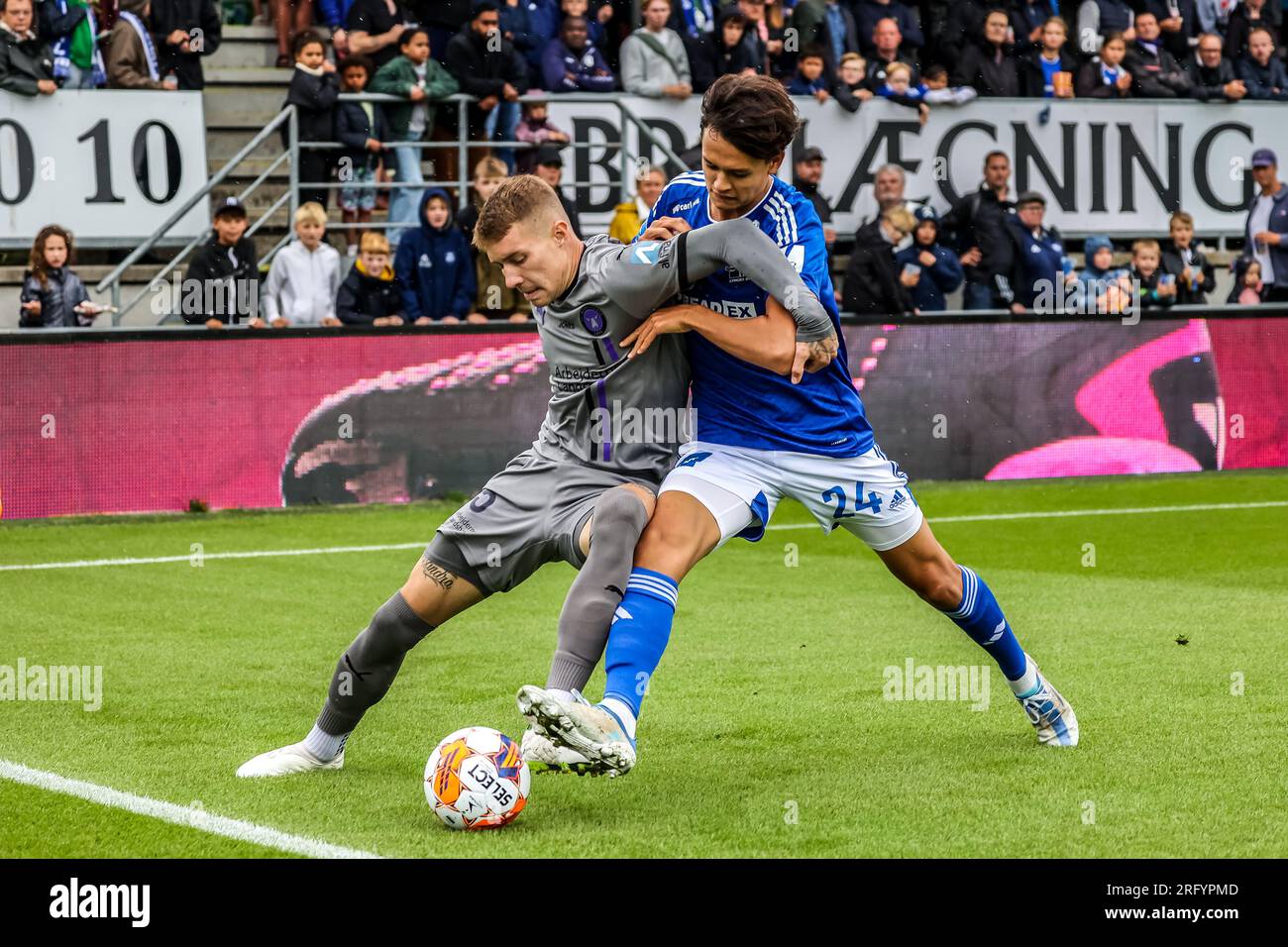 Lyngby, Denmark. 06th Aug, 2023. Charles (35) of FC Midtjylland and Tobias Storm (24) of Lyngby BK seen during the 3F Superliga match between Lyngby BK and FC Midtjylland at Lyngby Stadium. (Photo Credit: Gonzales Photo/Alamy Live News Stock Photo