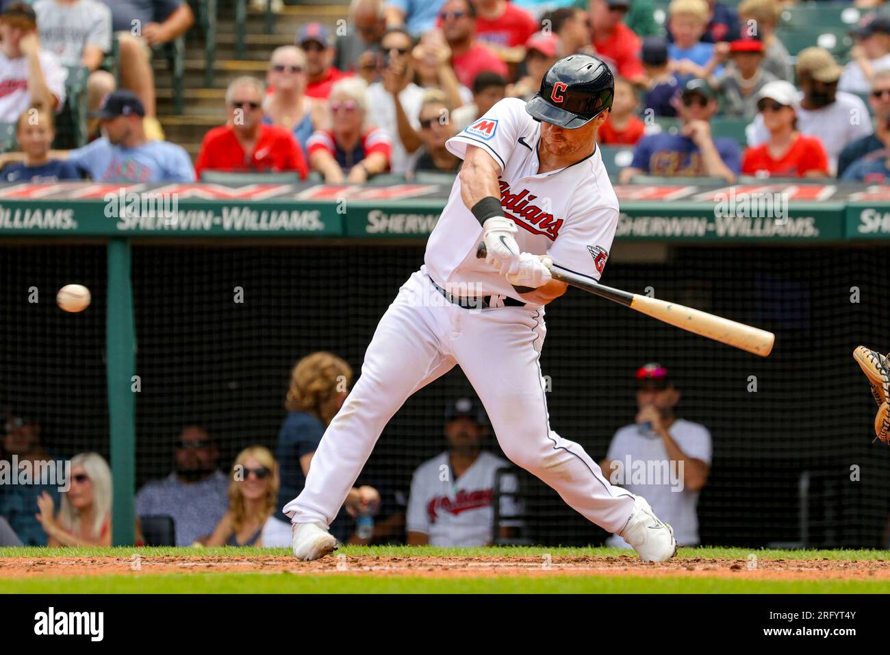 CLEVELAND, OH - AUGUST 06: Cleveland Guardians first baseman Kole Calhoun  (56) doubles during the fifth inning of the Major League Baseball game  between the Chicago White Sox and Cleveland Guardians on
