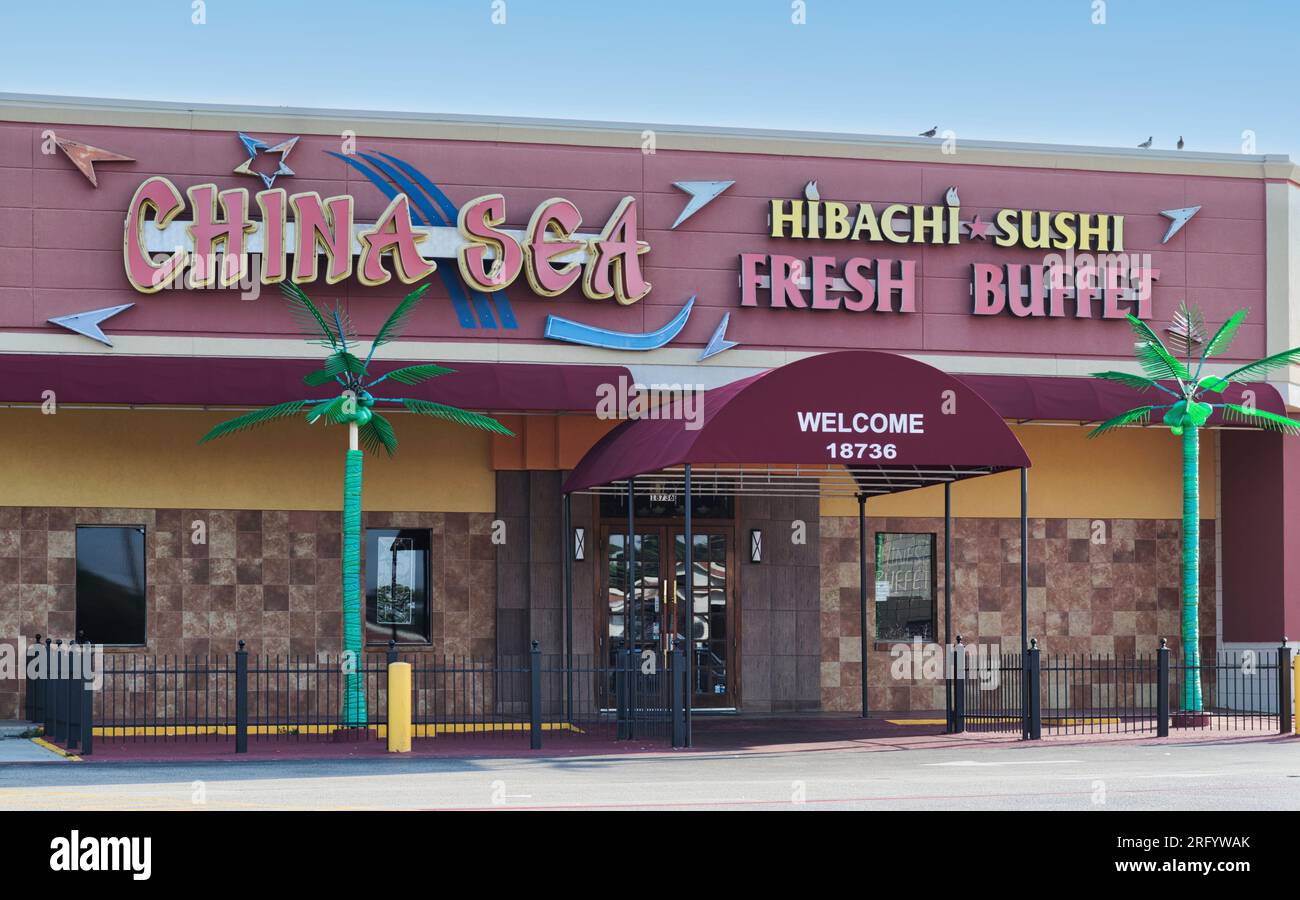 Houston, Texas USA 07-30-2023: China Sea Hibachi Buffet storefront exterior in Houston, TX. Local Chinese restaurant and buffet in a strip mall. Stock Photo