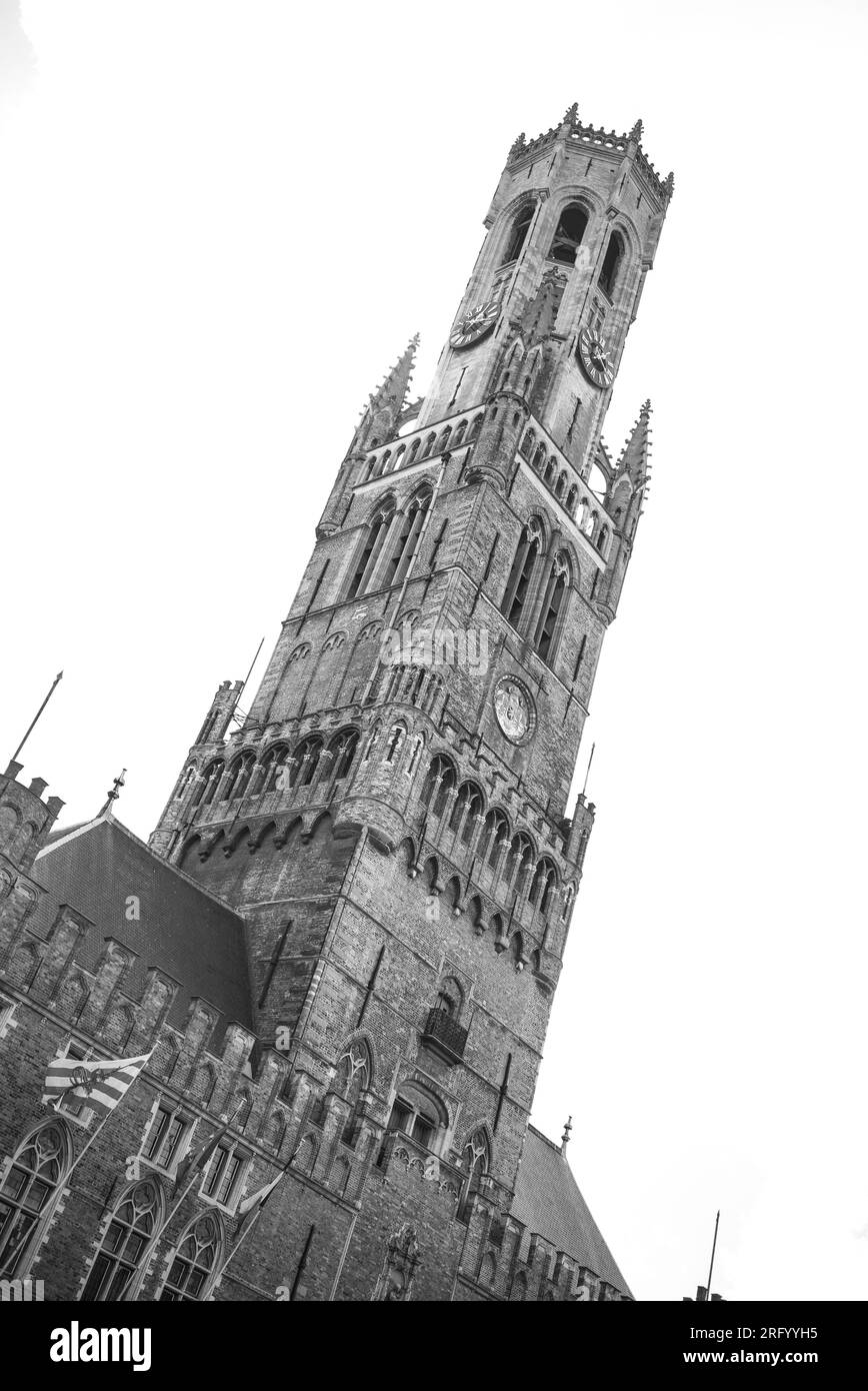 view of the The beffroi belfry of Bruges is a medieval building located in the historic center and is a UNESCO World Heritage Site, in Bruges, on Augu Stock Photo