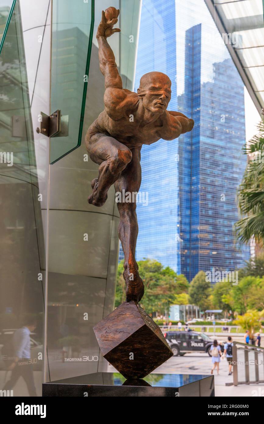 'Blind Faith Heroic' 2007 Bronze statue by Richard MacDonald in the foyer of OUE Bayfront, Singapore Stock Photo