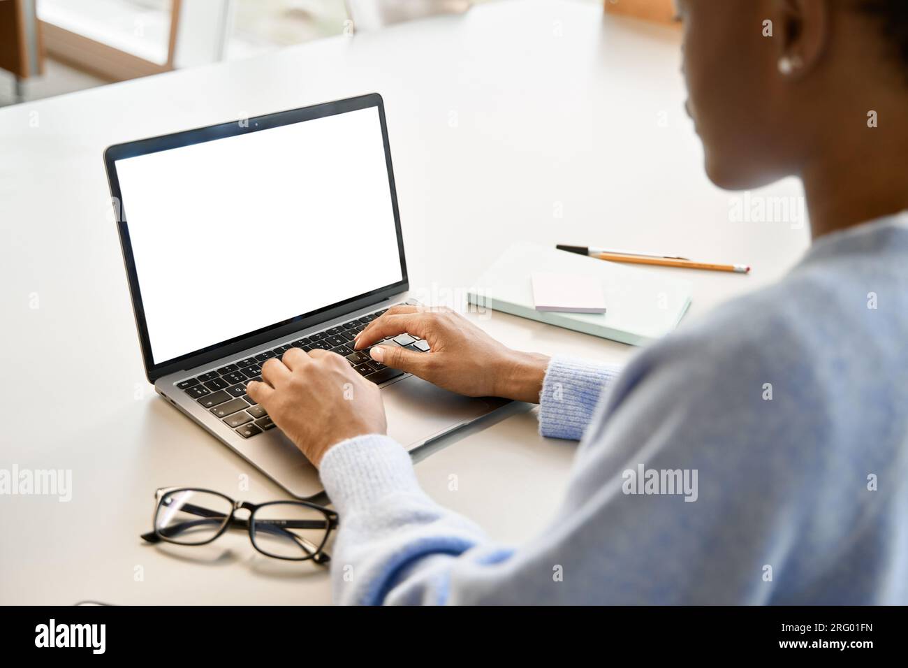 African Black girl student elearning using laptop, mock up. Over ...