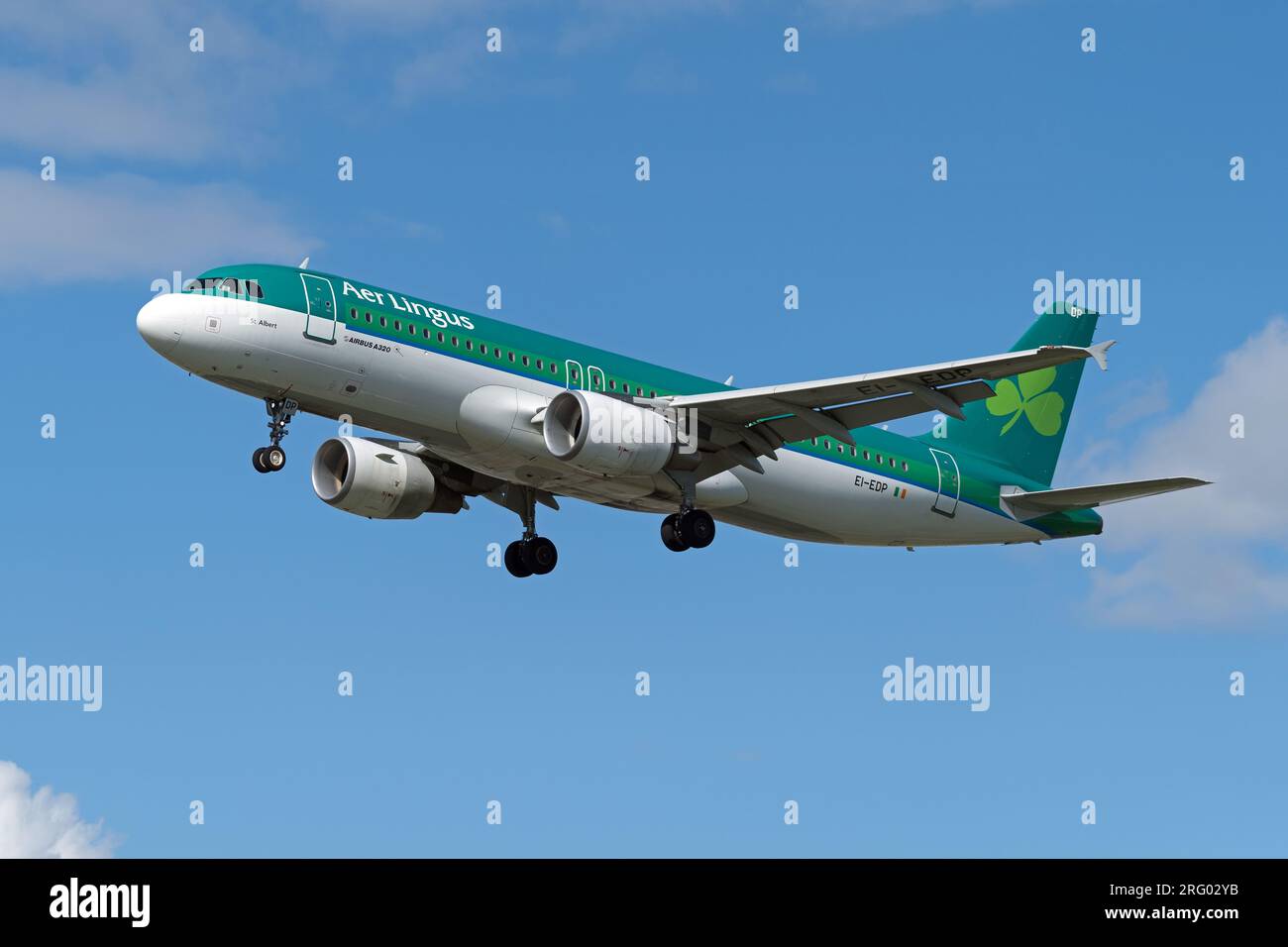 Aer Lingus Airbus A320 landing at London Heathrow Airport on a clear sunny day. London - 6th August 2023 Stock Photo