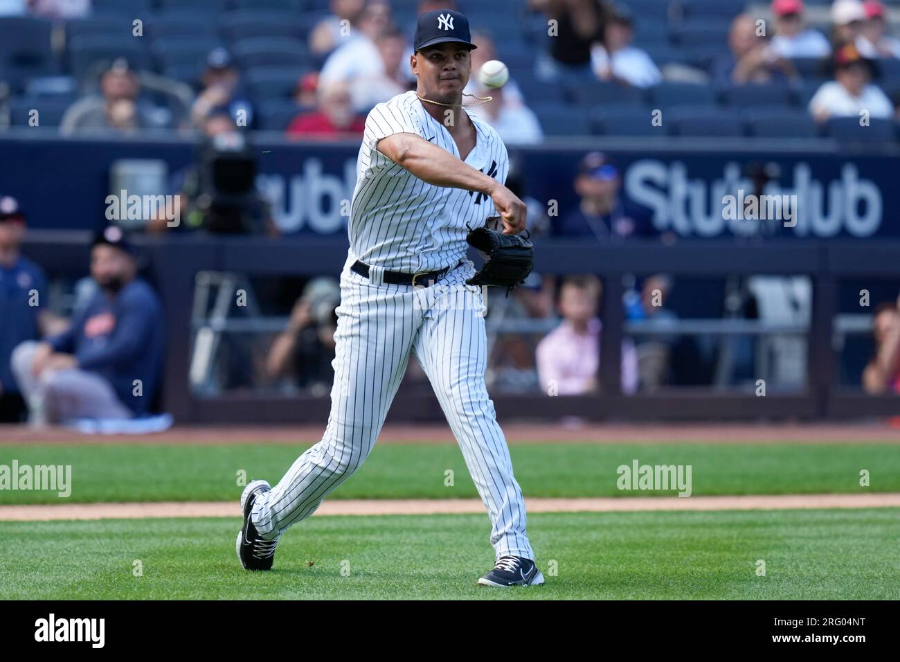 New York Yankees relief pitcher Albert Abreu throws to first base during  the ninth inning of the baseball game against the Houston Astros at Yankee  Stadium Sunday, Aug. 6, 2023, in New