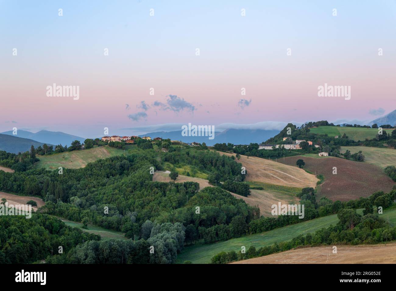 Sunrise over the hills of the village of Civitalba and Arcevia in the province of Ancona in the Marche region of Italy. Stock Photo