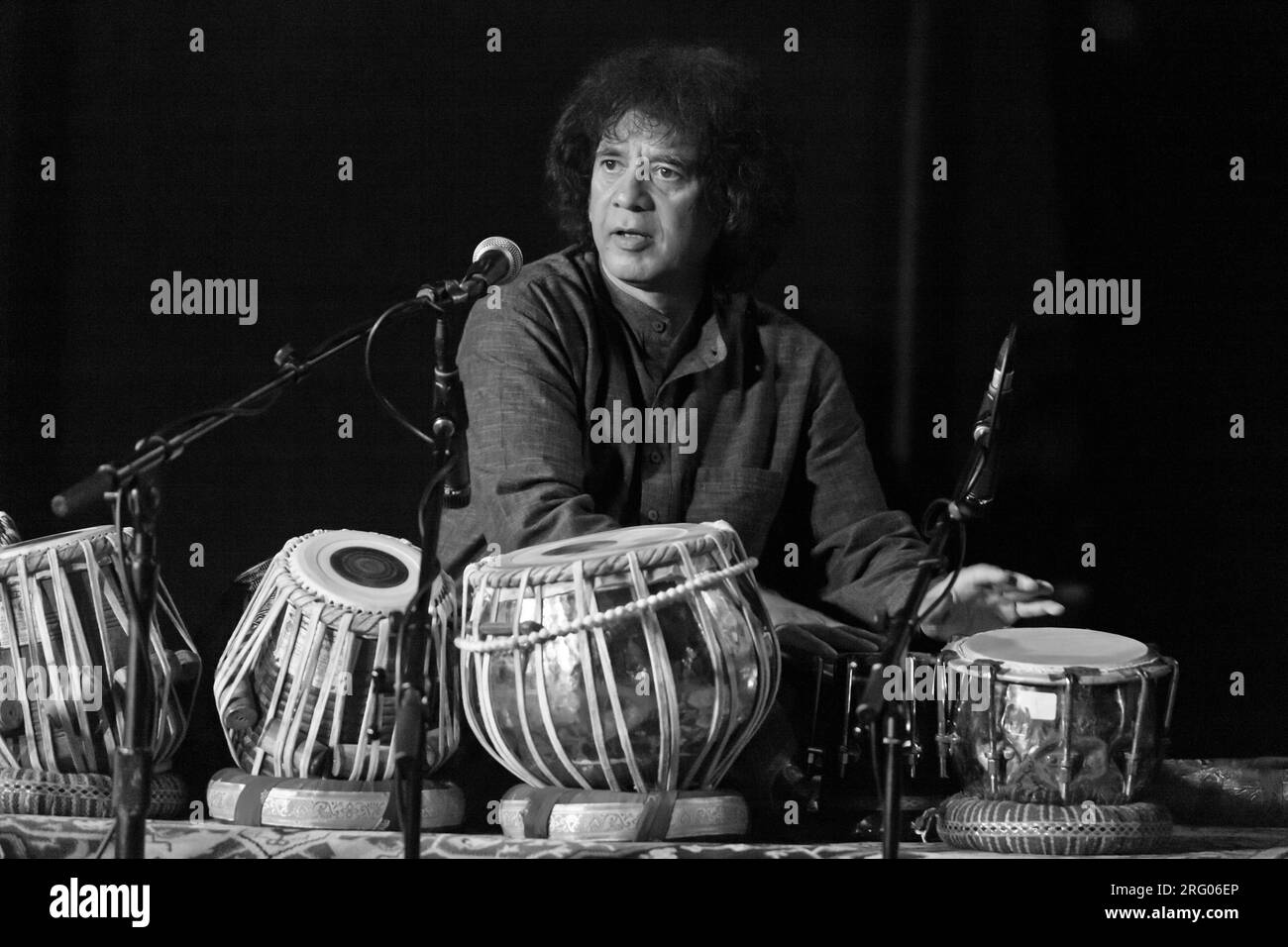 CHARLES LLOYD on saxophone, ZAKIR HUSSAIN on tablas and ERIC HARLAND on drums preform as SANGAM at the MONTEREY JAZZ FESTIVAL Stock Photo