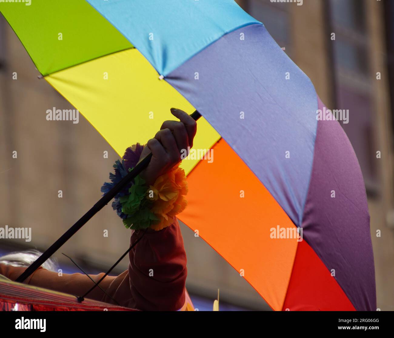 Person holding small umbrella hi-res stock photography and images - Alamy