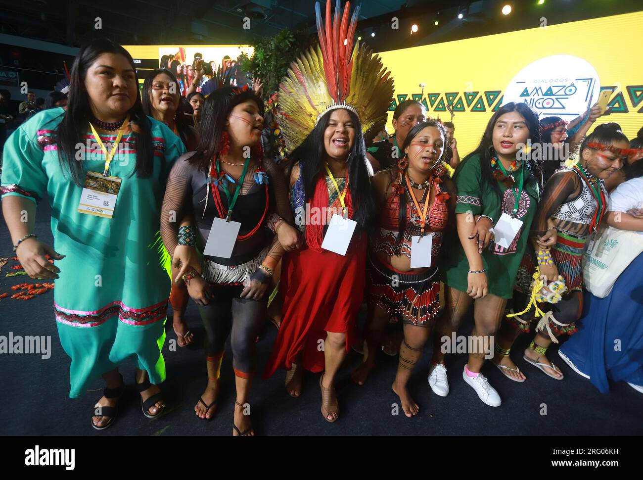 Sonia Guajajara, Minister of Indigenous Peoples, center, dances with